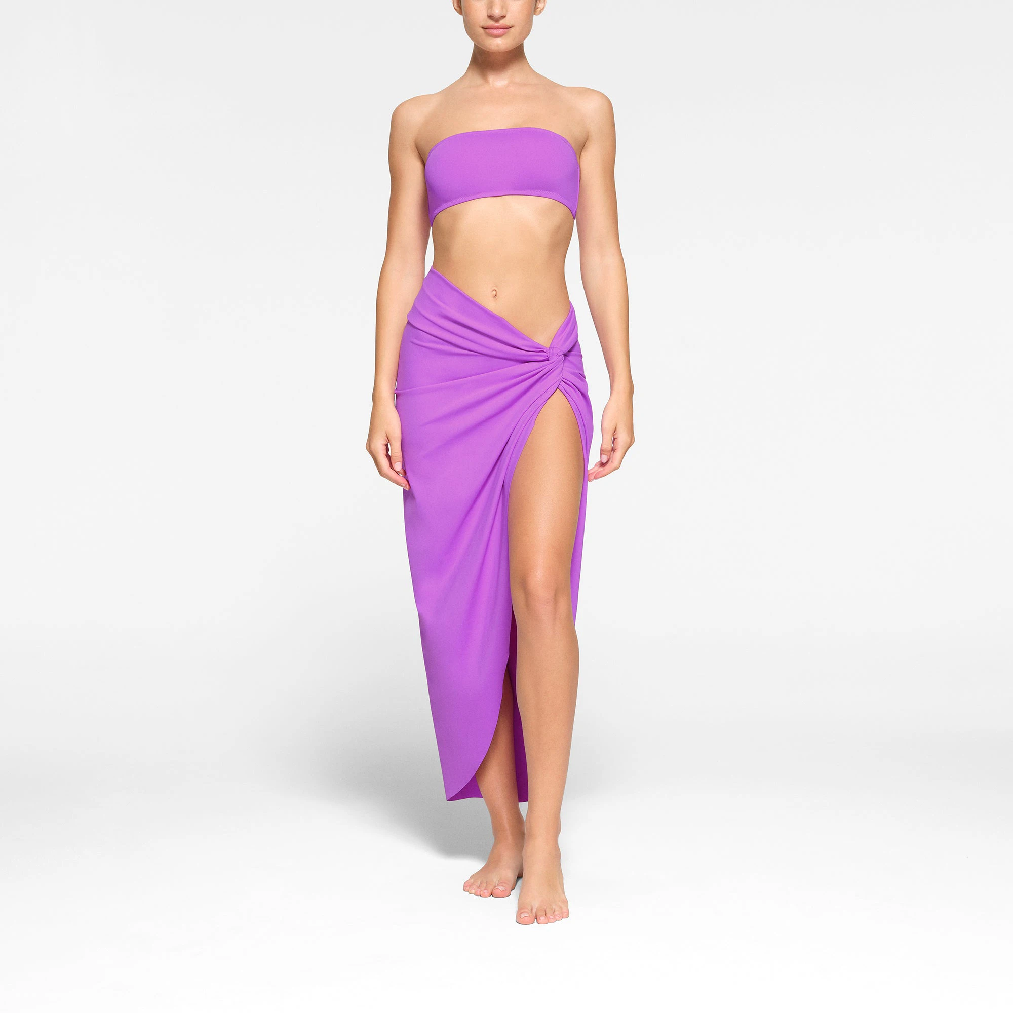 SWIM SARONG SKIRT WORN BY A MODEL IN FRONT VIEW