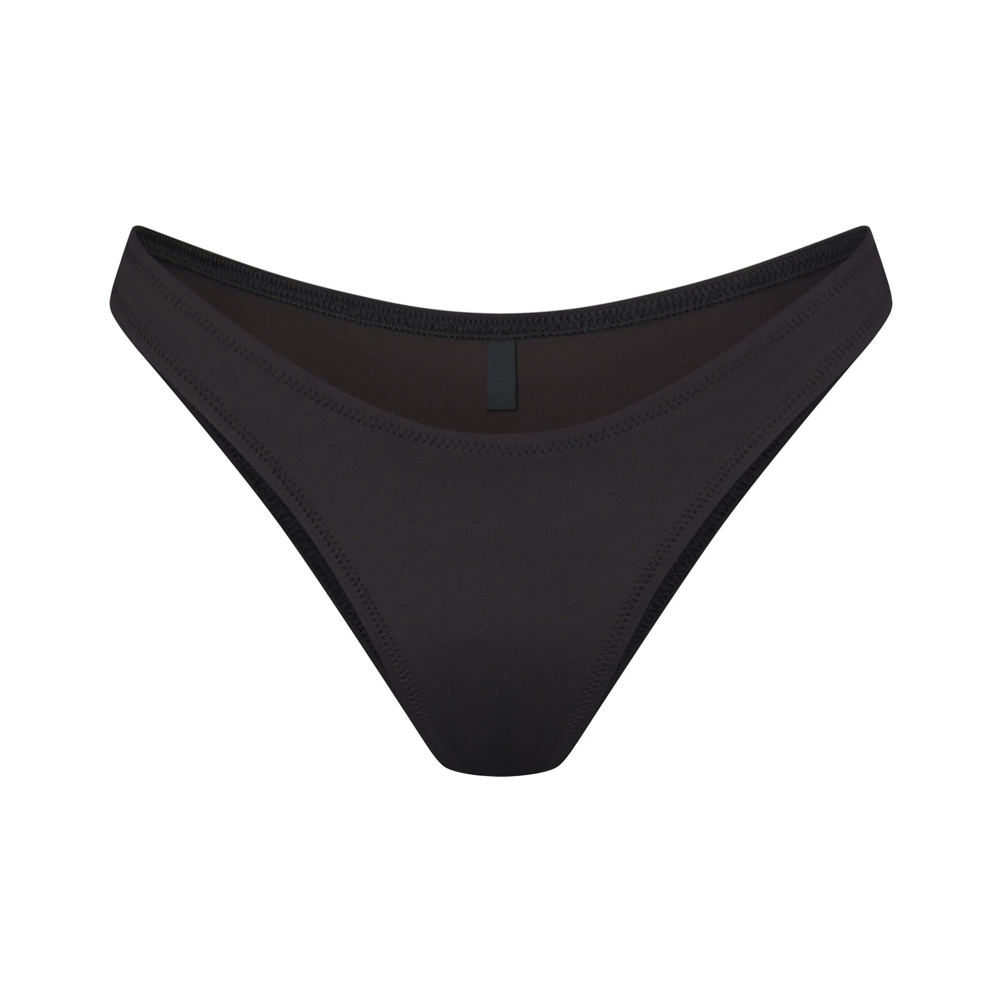 SIGNATURE SWIM CHEEKY TANGA BOTTOM | ONYX (BIKINI BOTTOMS, SWIM) LAYS FLAT ON A WHITE BACKGROUND | FLT