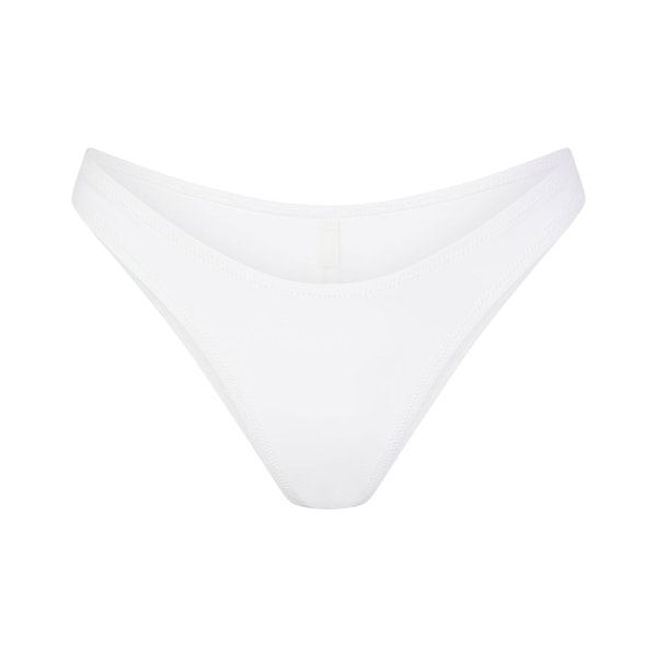 SIGNATURE SWIM CHEEKY TANGA BOTTOM | SNOW (BIKINI BOTTOMS, SWIM) LAYS FLAT ON A WHITE BACKGROUND | FLT