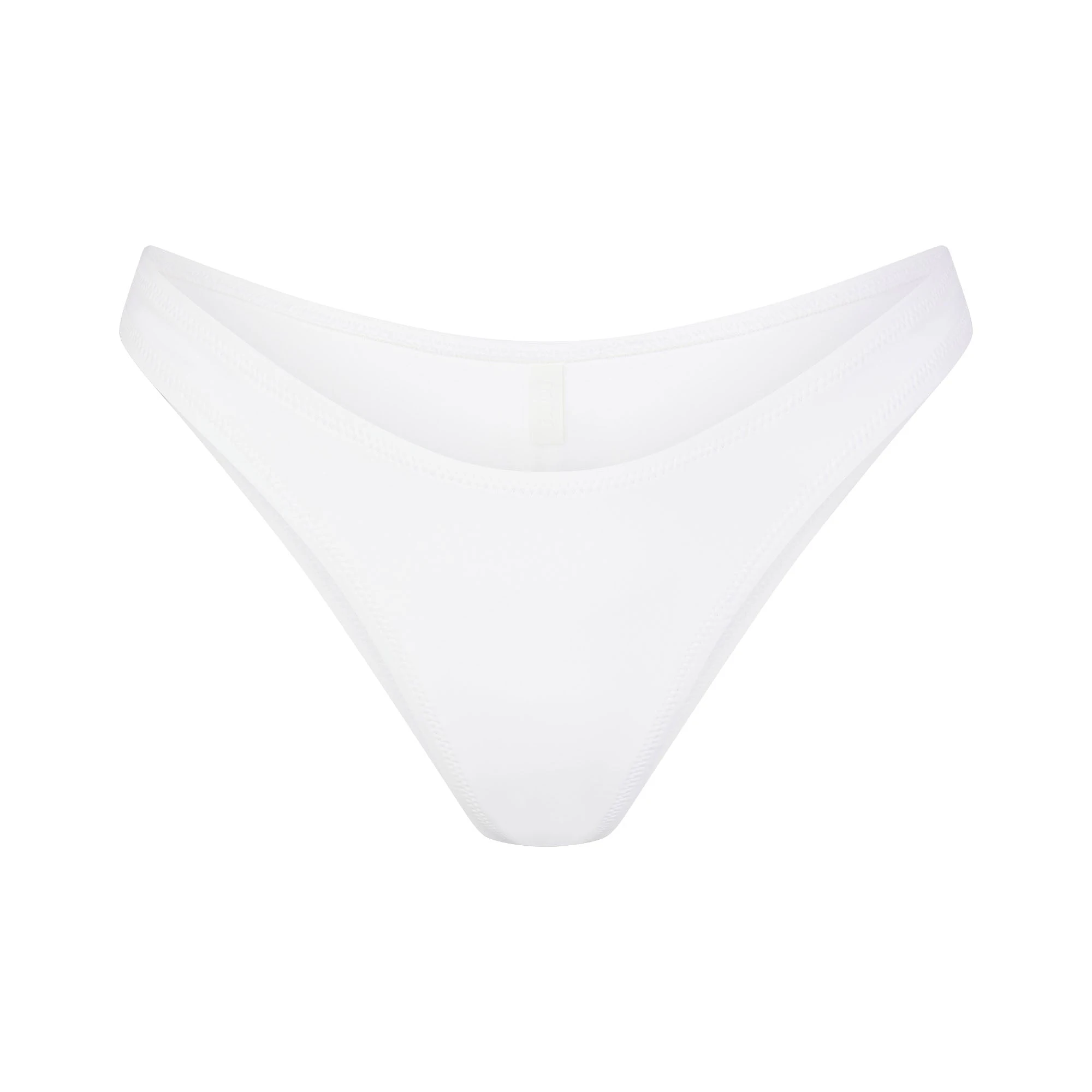 SIGNATURE SWIM CHEEKY TANGA BOTTOM | SNOW (BIKINI BOTTOMS, SWIM) LAYS FLAT ON A WHITE BACKGROUND | FLT