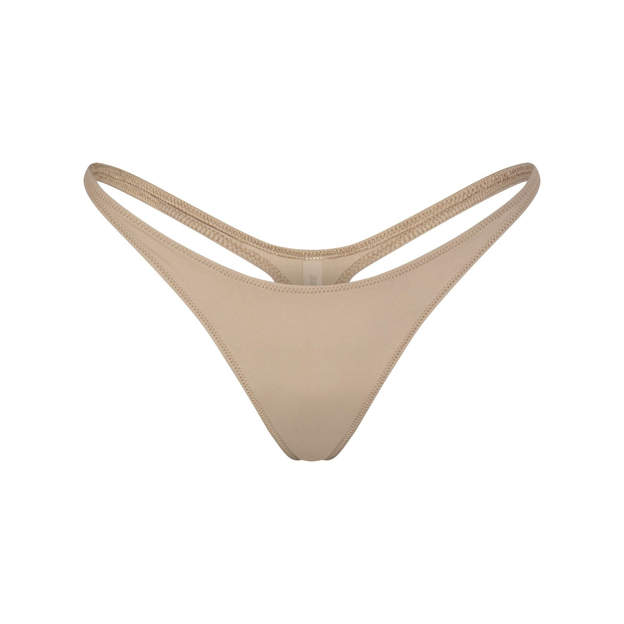 SIGNATURE SWIM THONG | DESERT (BIKINI BOTTOMS, SWIM) LAYS FLAT ON A WHITE BACKGROUND | FLT