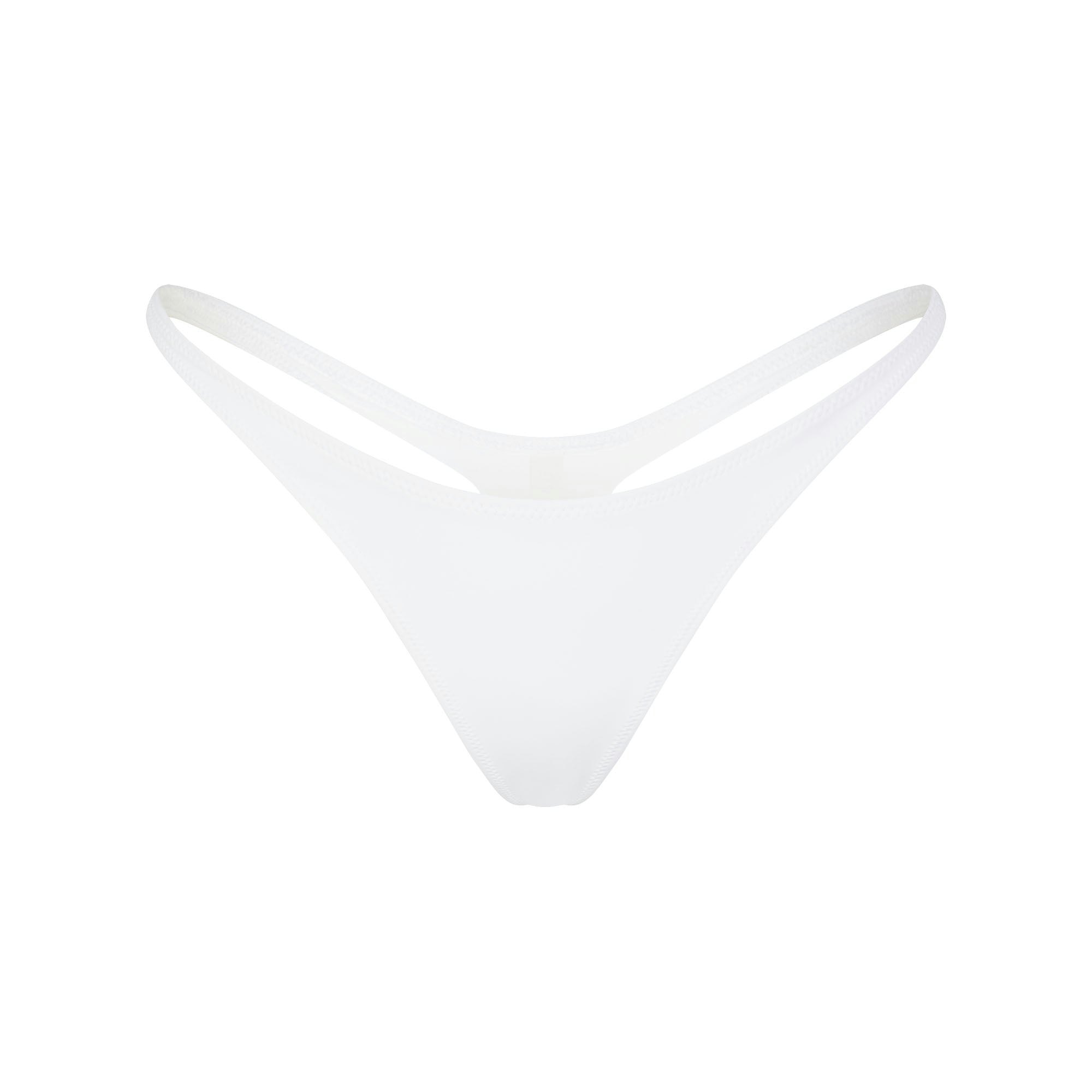 SIGNATURE SWIM THONG | SNOW (BIKINI TOPS, SWIM) LAYS FLAT ON A WHITE BACKGROUND | FLT
