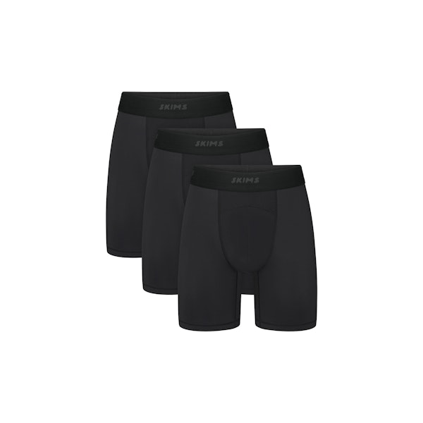 SKIMS SPORT MENS 7" BOXER BRIEF 3-PACK | OBSIDIAN (MENS BOXERS) FLAT ON A WHITE BACKGROUND | FLT | FOCUS: 0.0, 1.0, 0.9