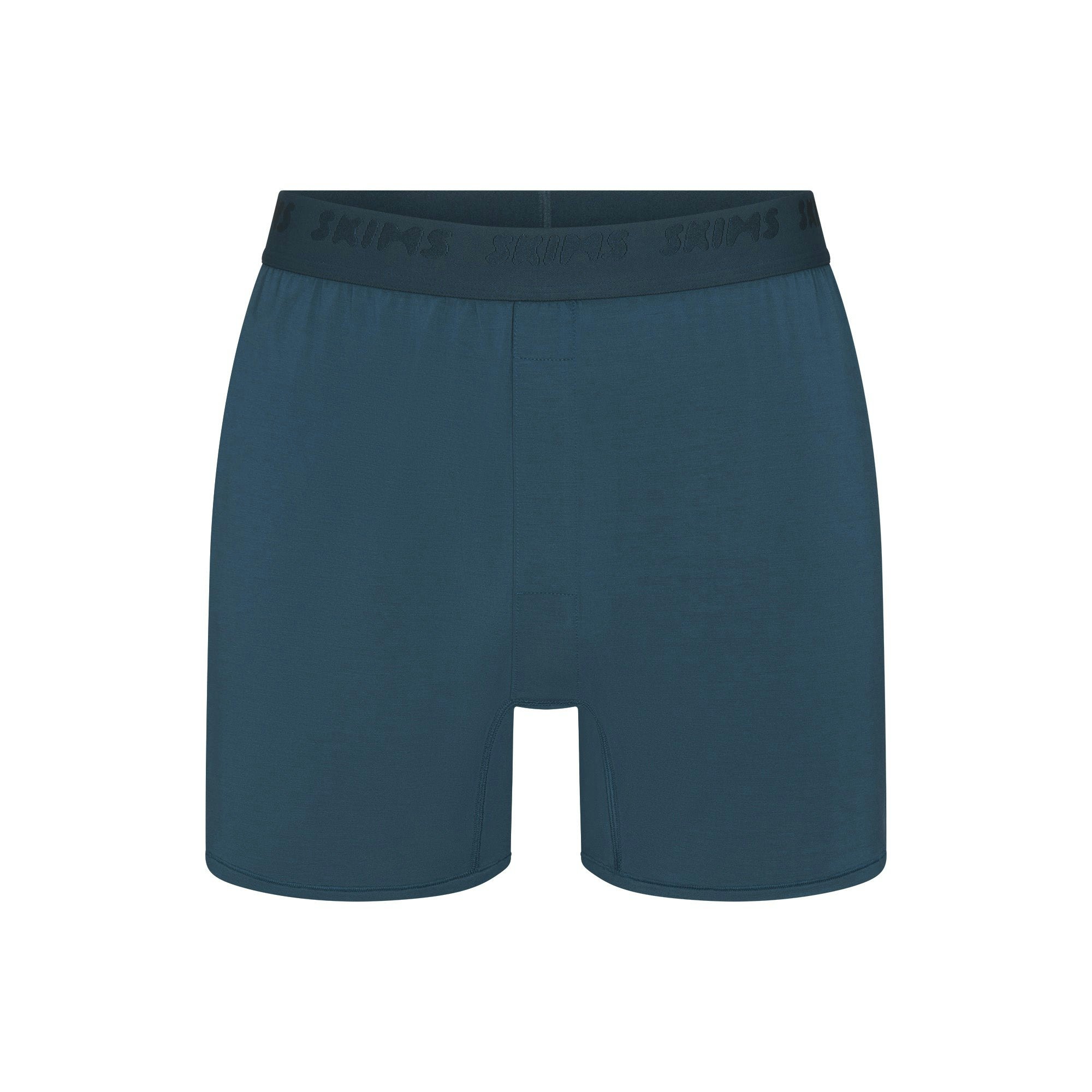 SKIMS STRETCH MENS KNIT BOXER | INDIGO FLAT ON A WHITE BACKGROUND | FLT | FOCUS: 0.0, 1.0, 0.9