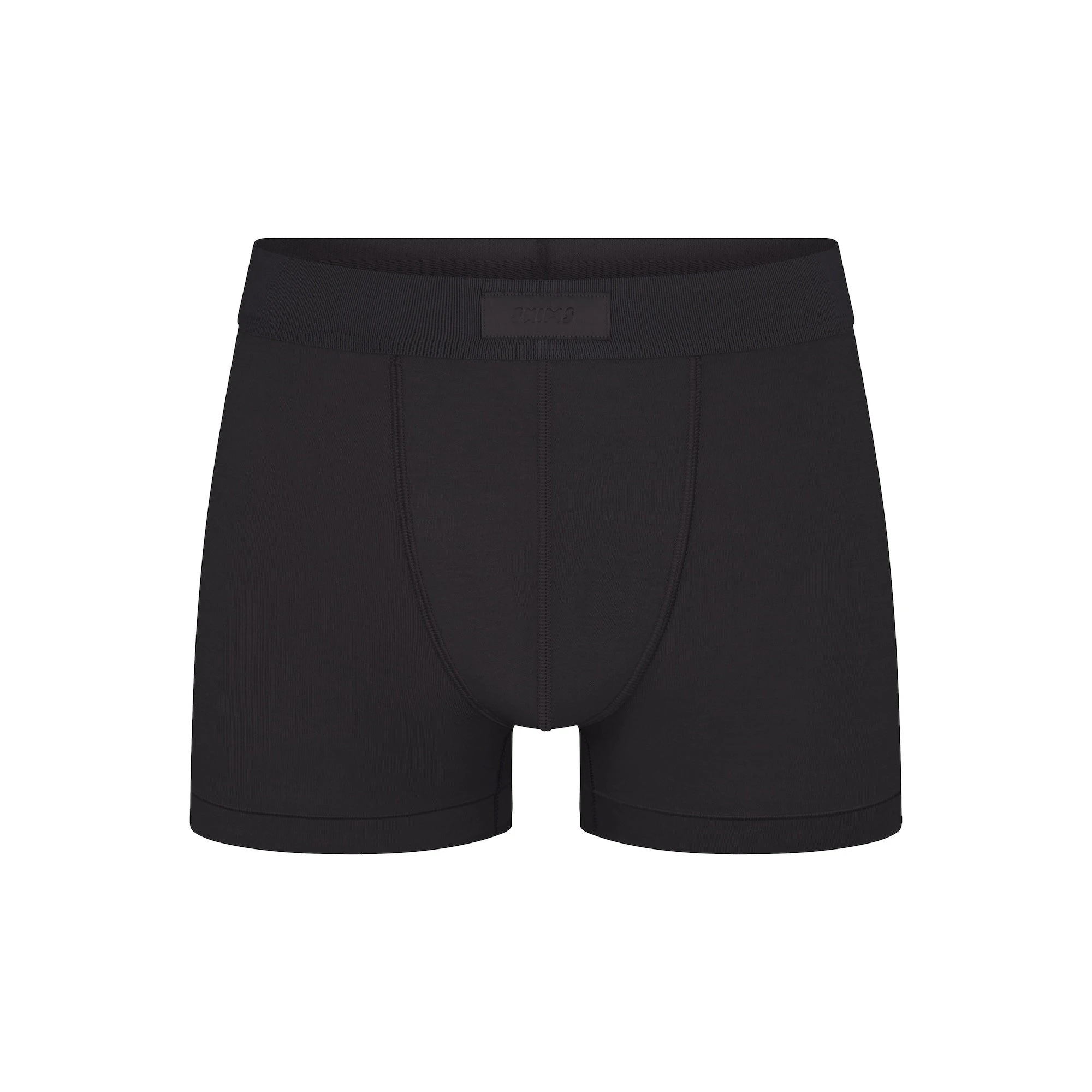 SKIMS COTTON MENS TRUNK | ONYX (MENS BOXERS) FLAT ON A WHITE BACKGROUND | FLT