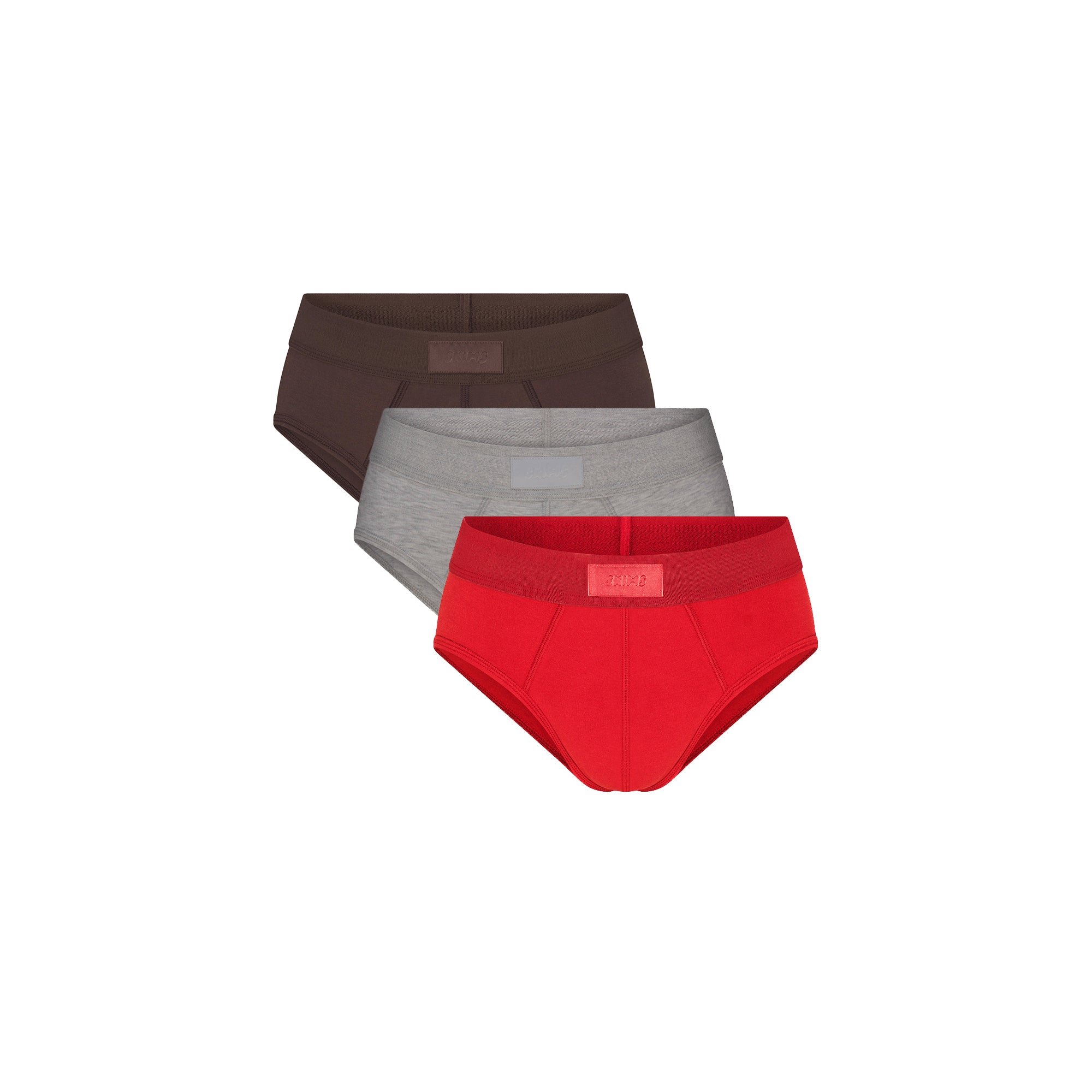 SKIMS COTTON MENS BRIEF 3-PACK | RUBY ESPRESSO MULTI FLAT ON A WHITE BACKGROUND | FLT @ | FOCUS: 0.0, 1.0, 0.9