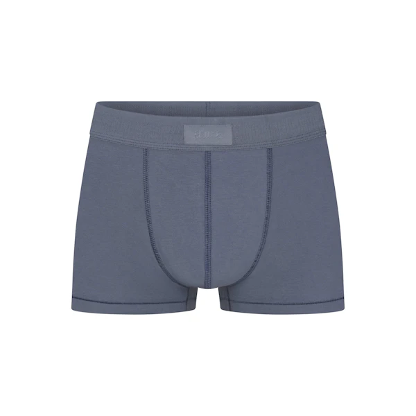 SKIMS COTTON MENS TRUNK | STEEL BLUE FLAT ON A WHITE BACKGROUND | FLT
