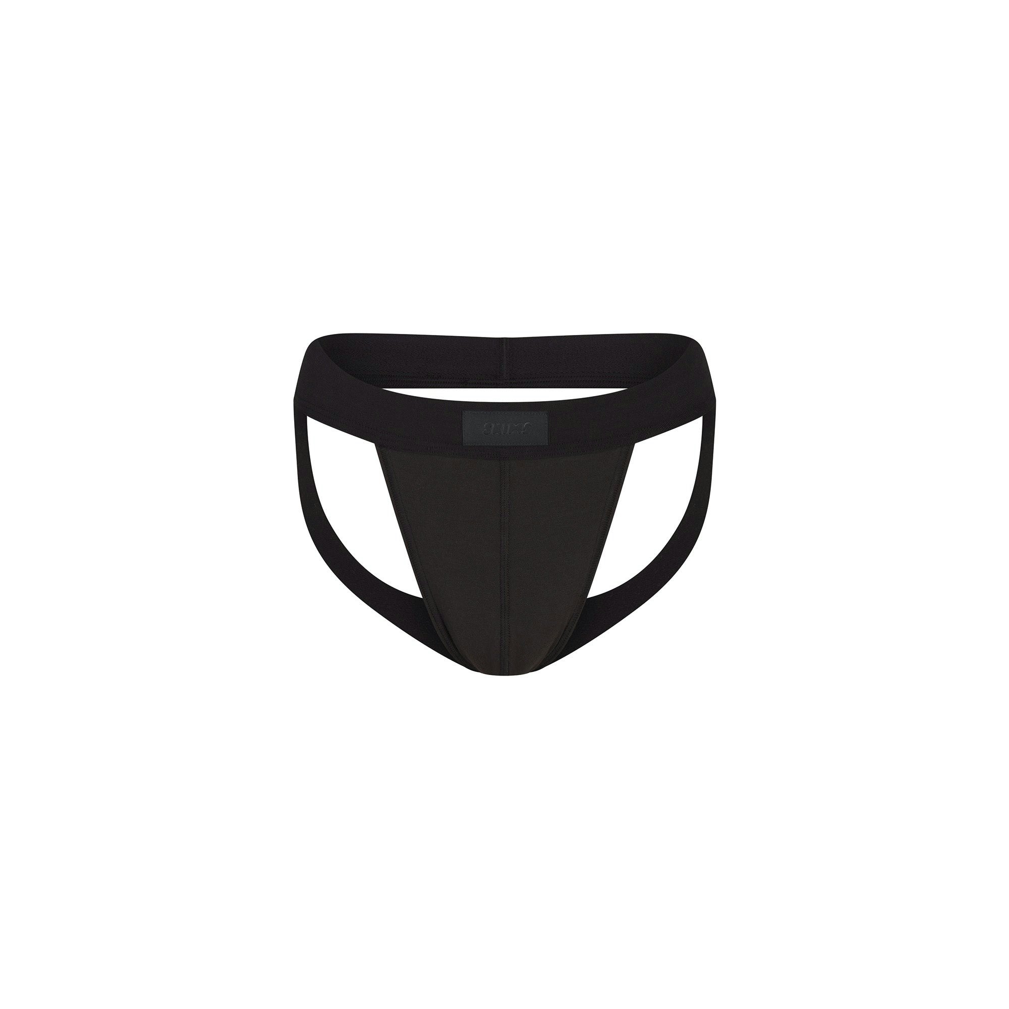 SKIMS COTTON MENS JOCKSTRAP | ONYX FLAT ON A WHITE BACKGROUND @ | FOCUS: 0.0, 1.0, 0.9