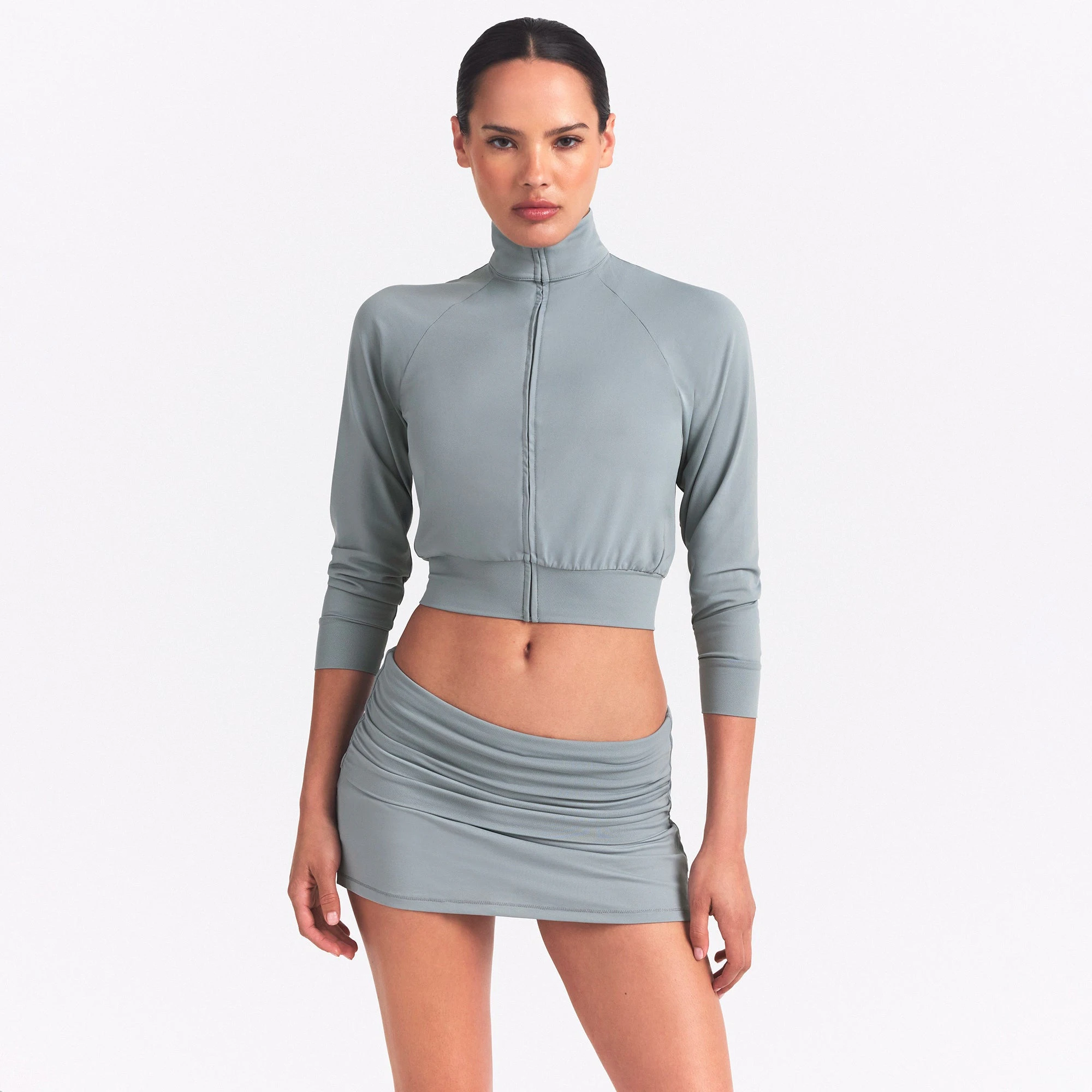 NikeSKIMS AIRY FOLDOVER SKORT | WASHED PACIFIC ON A MODEL SIDE VIEW @ | FOCUS: 0.0, 1.0, 0.9