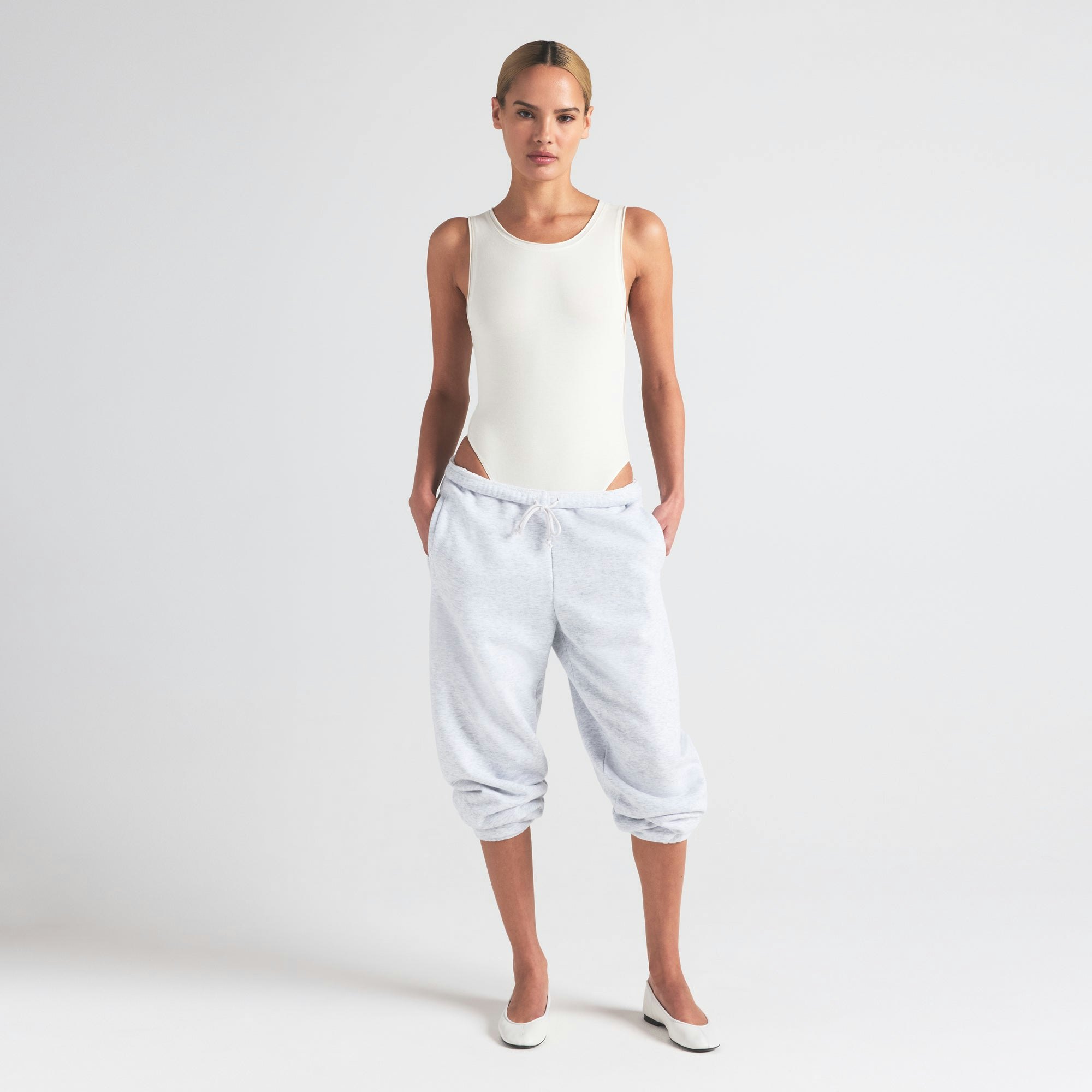 COTTON JERSEY TANK BODYSUIT | MARBLE ON A MODEL FRONT VIEW | FOCUS: 0.0, 1.0, 0.9