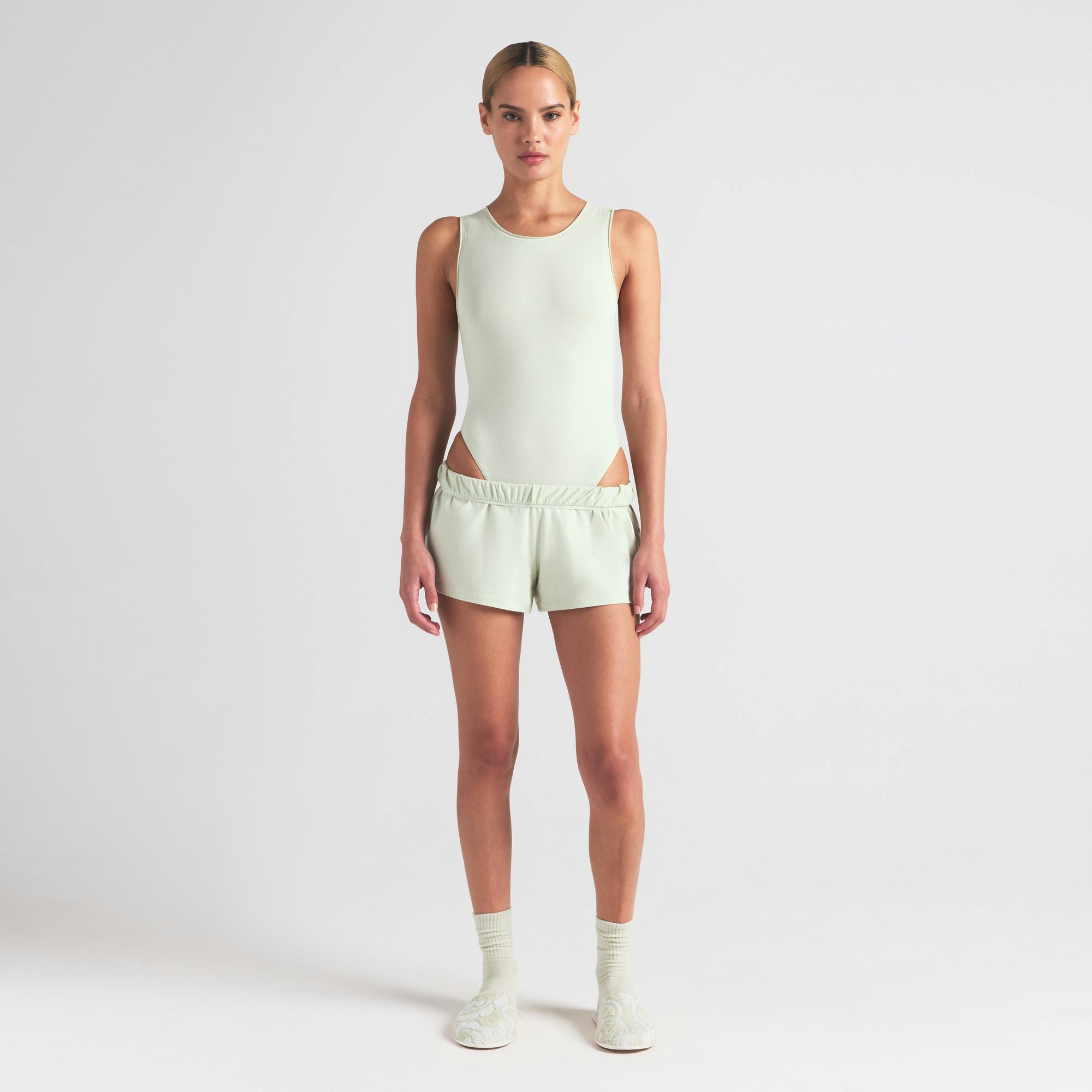COTTON JERSEY TANK BODYSUIT | SPEARMINT ON A MODEL FRONT VIEW | FOCUS: 0.0, 1.0, 0.9