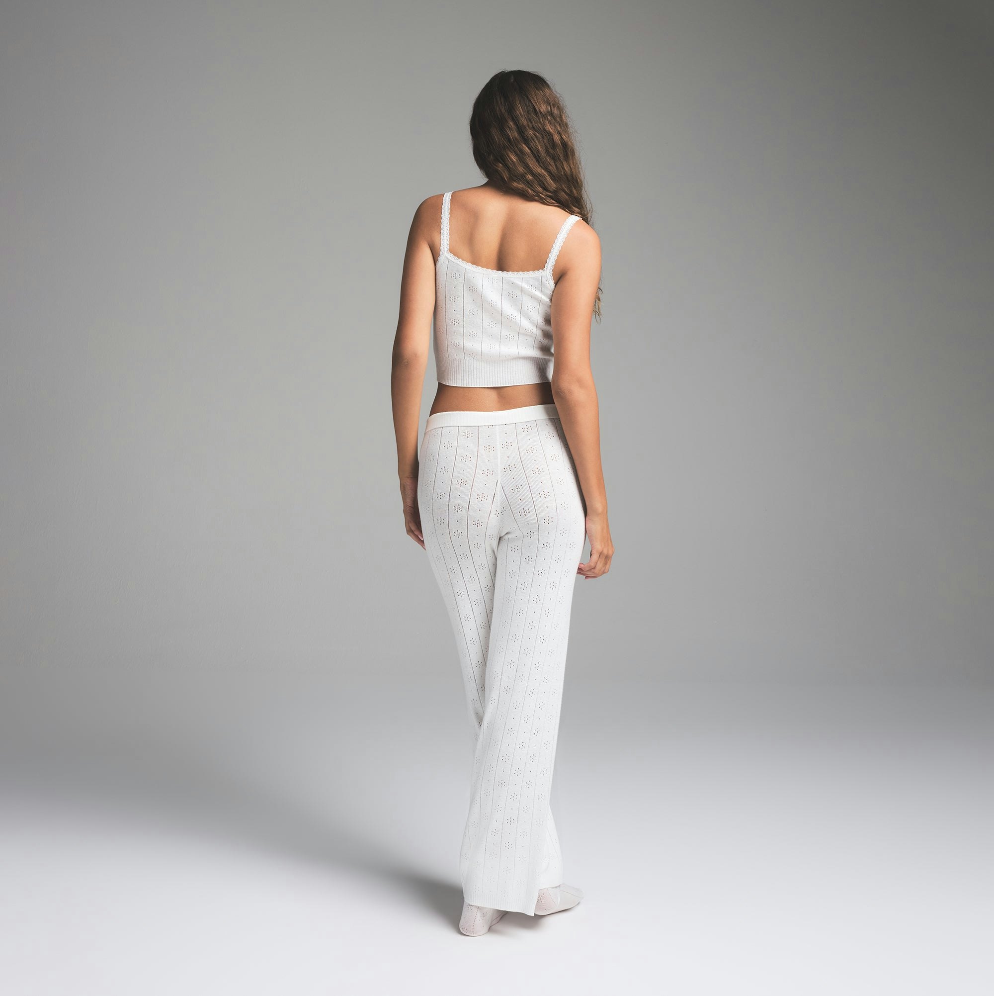 SWEATER POINTELLE CAMI | MARBLE ON A MODEL SIDE VIEW