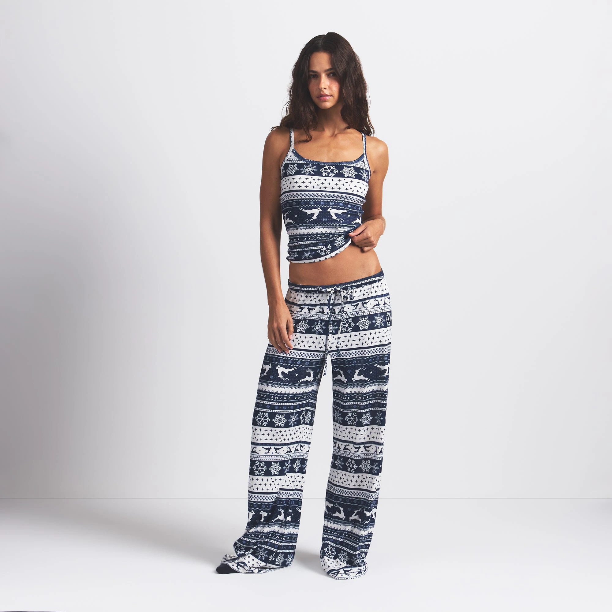 LOGO PLUSH POINTELLE CAMI | NAVY DEER FAIR ISLE ON A MODEL FRONT VIEW @ | FOCUS: 0.0, 1.0, 0.9