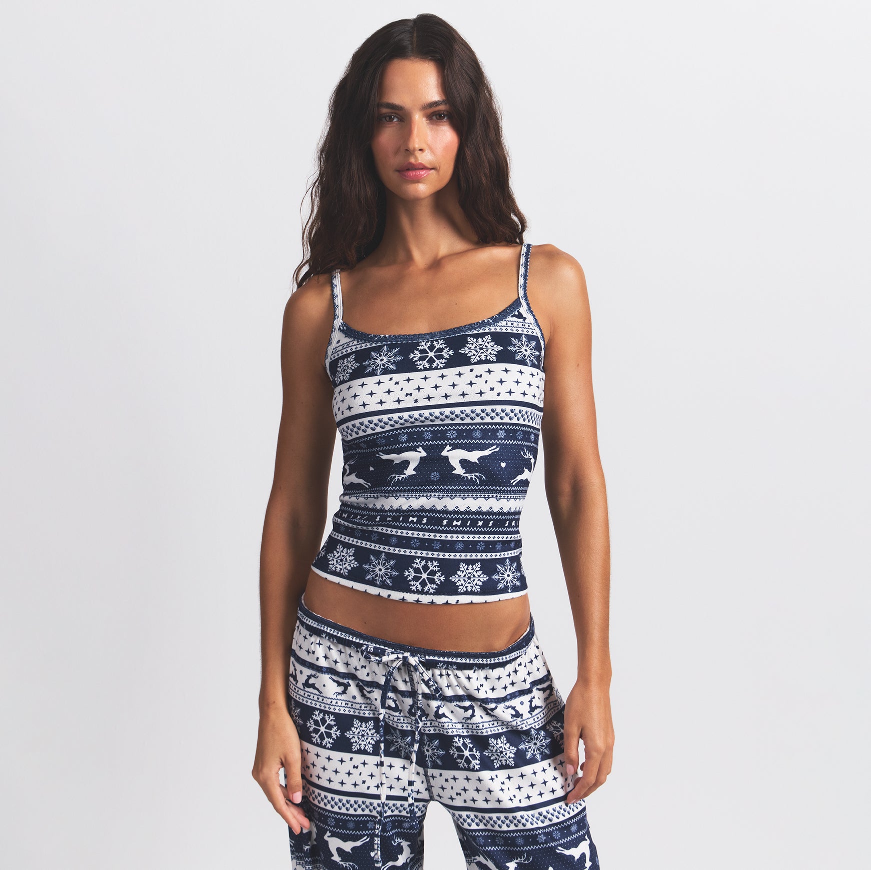 LOGO PLUSH POINTELLE CAMI | NAVY DEER FAIR ISLE ON A MODEL FRONT VIEW @ | FOCUS: 0.0, 1.0, 0.9