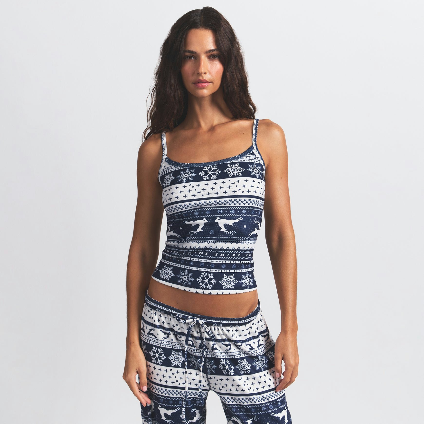 LOGO PLUSH POINTELLE CAMI | NAVY DEER FAIR ISLE ON A MODEL FRONT VIEW @ | FOCUS: 0.0, 1.0, 0.9