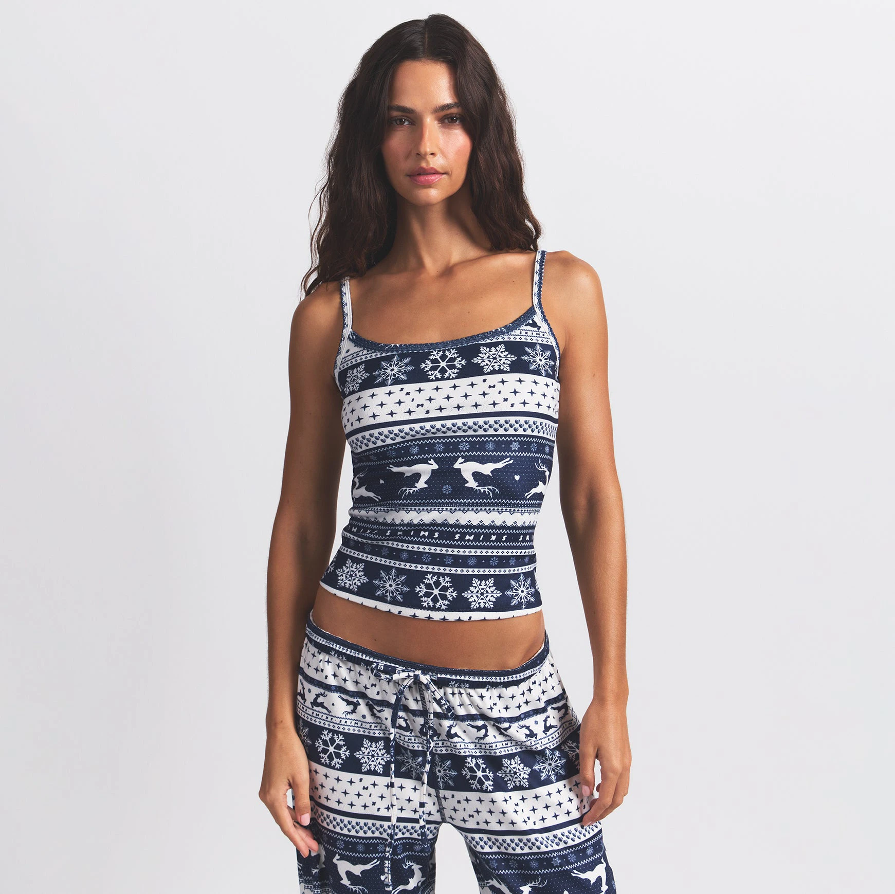 LOGO PLUSH POINTELLE CAMI | NAVY DEER FAIR ISLE ON A MODEL FRONT VIEW @ | FOCUS: 0.0, 1.0, 0.9