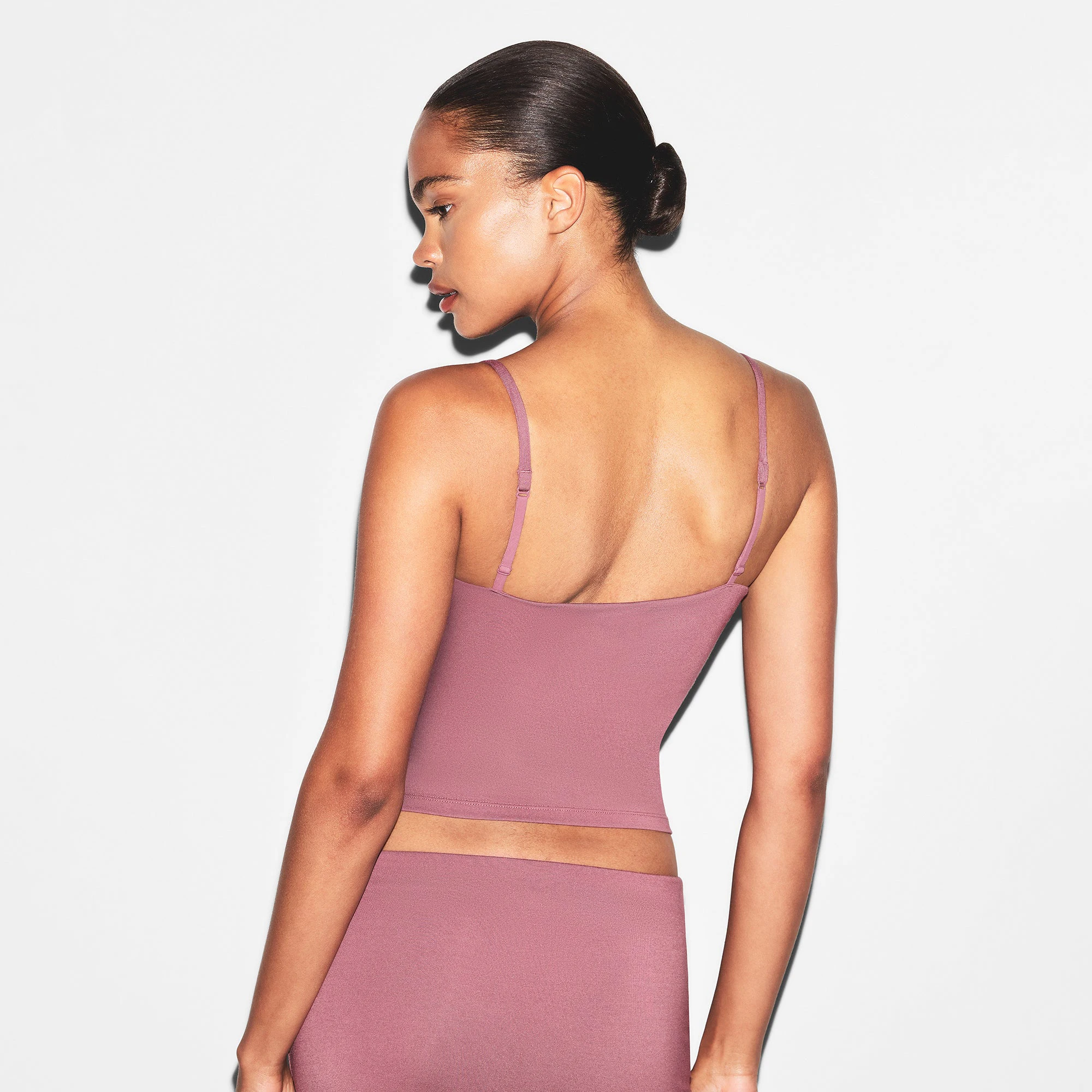 SMOOTH LAYERS CAMI | REDWOOD ON A MODEL BACK VIEW | FOCUS: 0.0, 1.0, 0.9