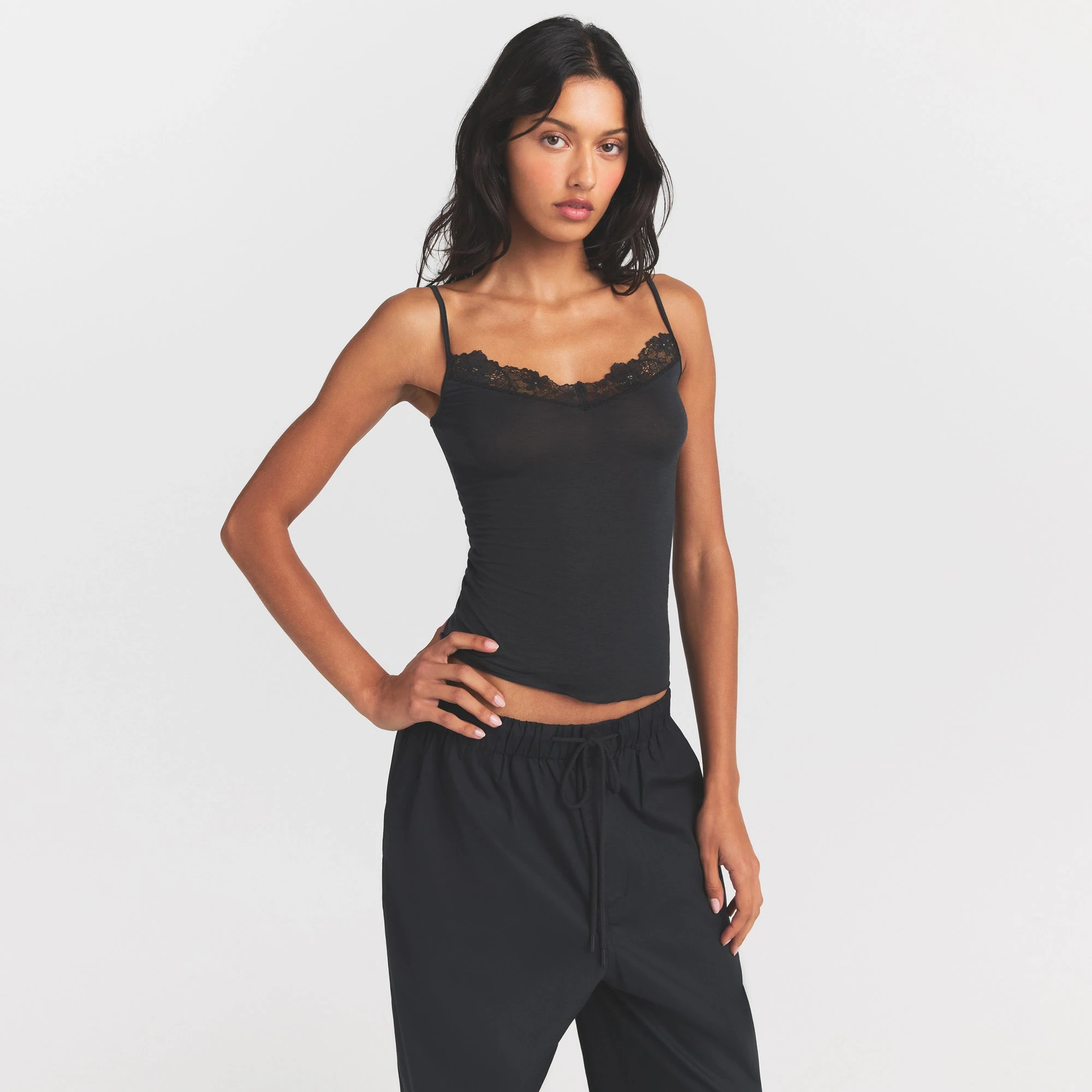 SHEER MODAL LACE CAMI | ONYX ON A MODEL SIDE VIEW