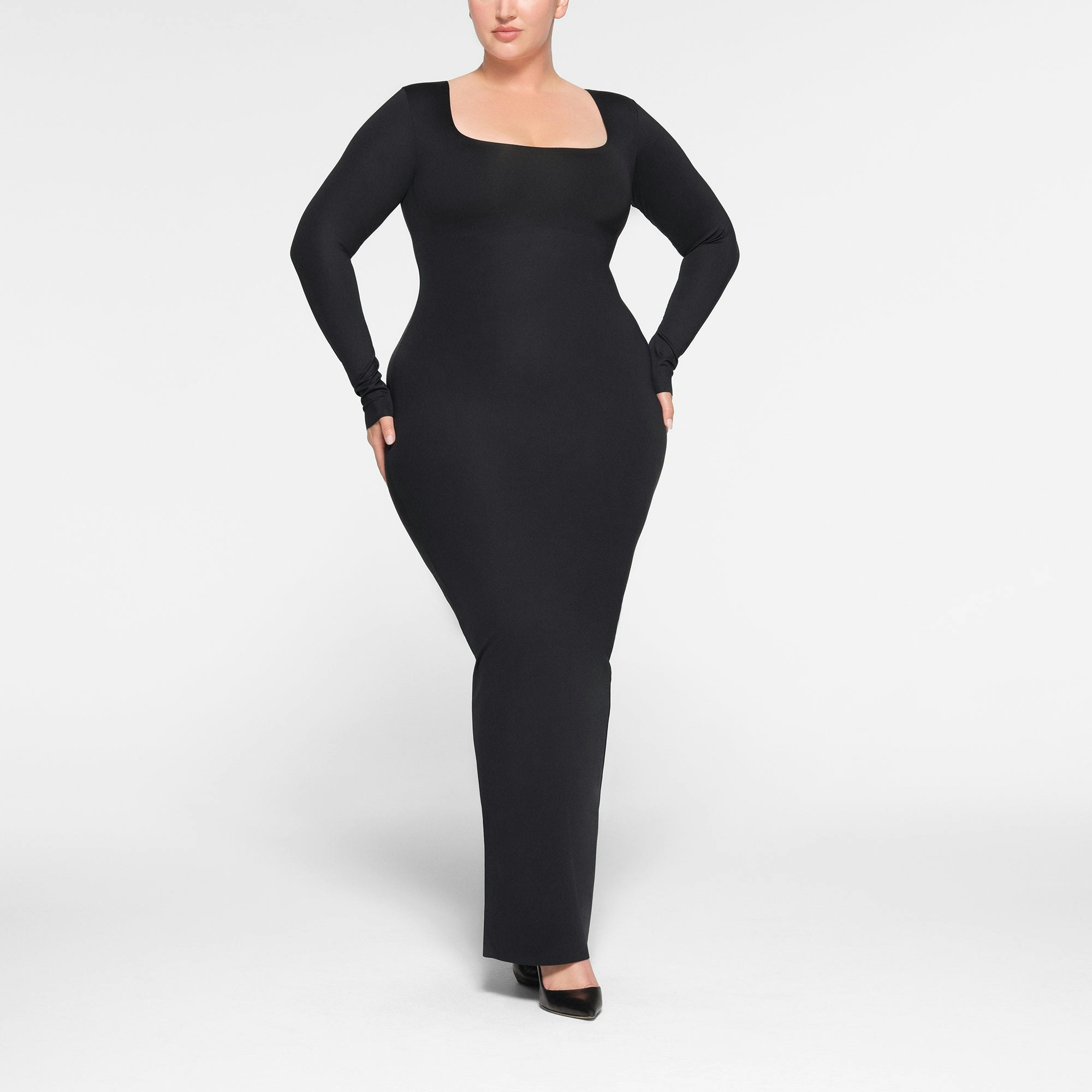SKIMS BODY LONG SLEEVE LONG DRESS WORN BY A MODEL IN FRONT VIEW | SEE: 2X, 3X, 4X