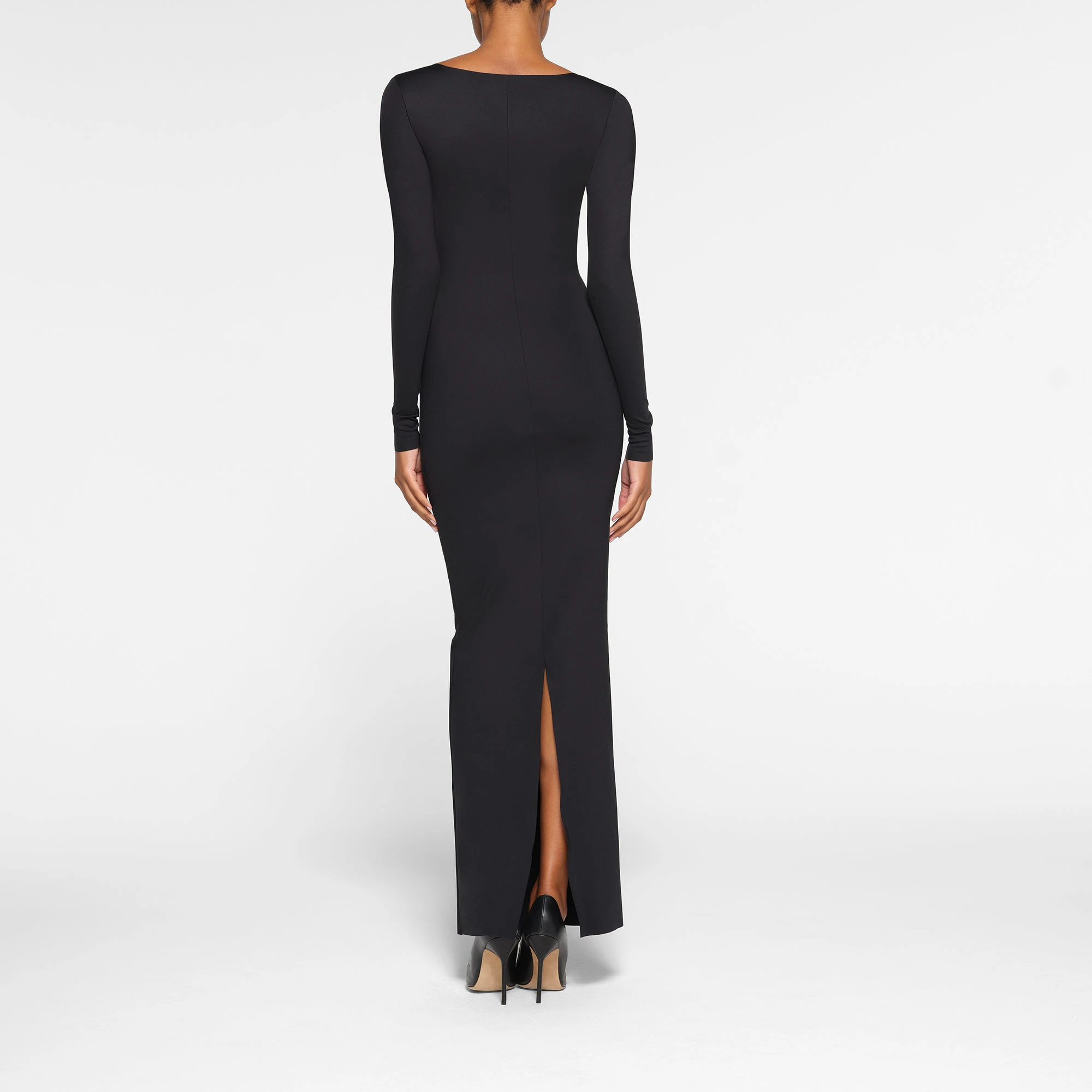 SKIMS BODY LONG SLEEVE LONG DRESS ON A MODEL BACK VIEW