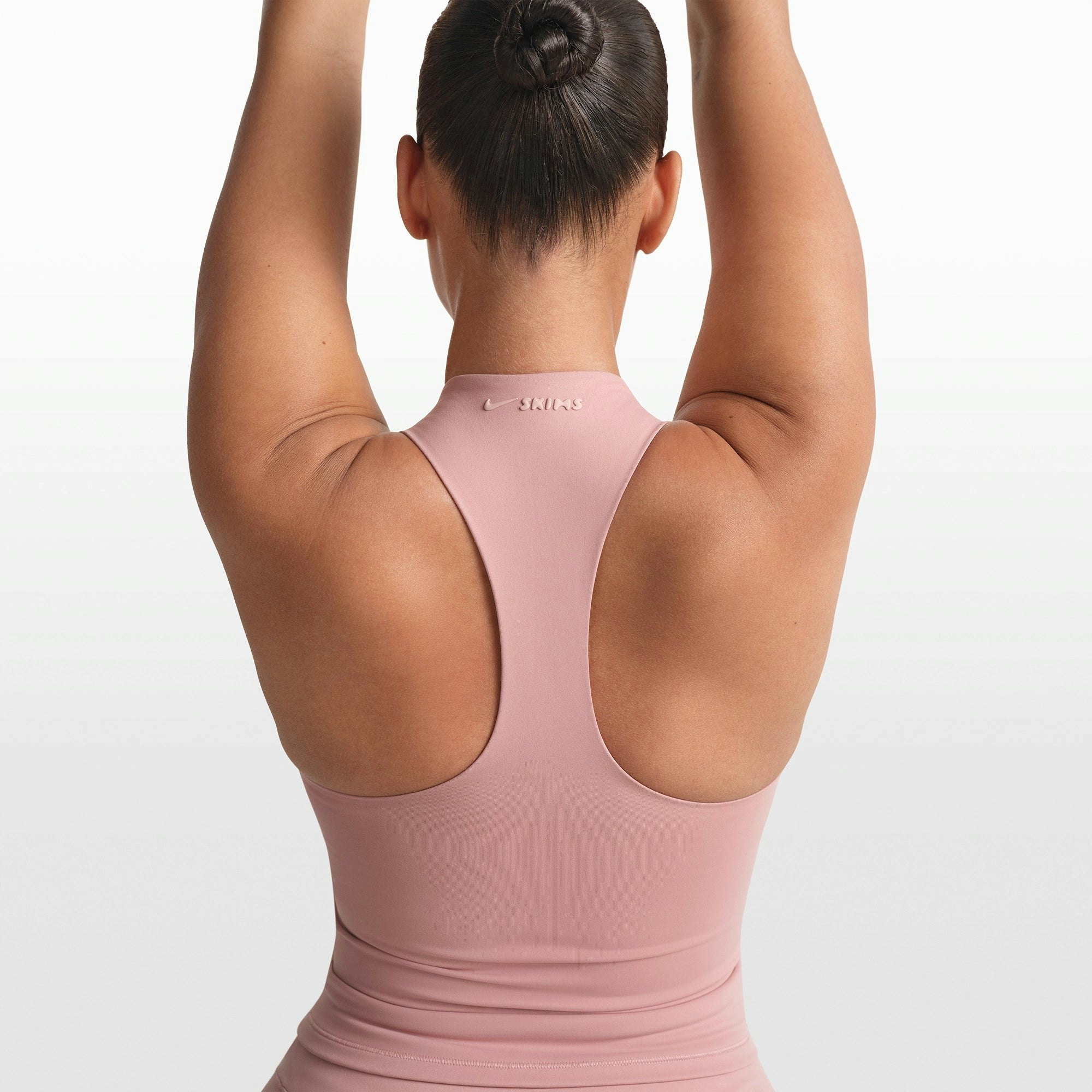 NikeSKIMS MATTE MOCK NECK RACER TANK | HIMALAYAN ON A MODEL FRONT VIEW @ | FOCUS: 0.0, 1.0, 0.9