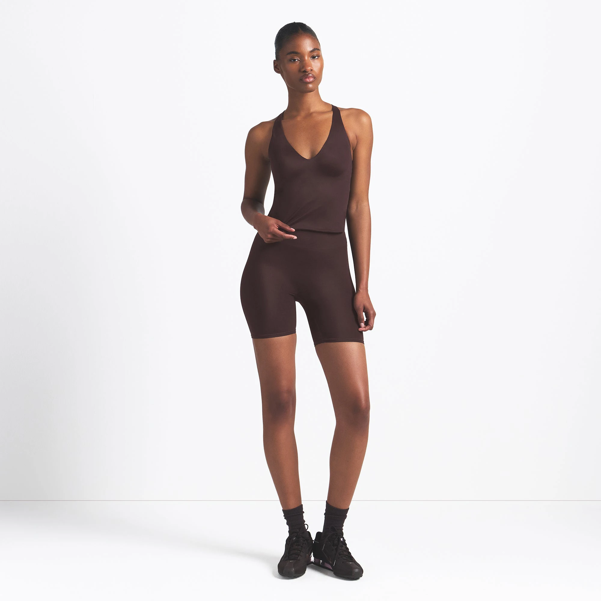 NikeSKIMS SHINE V-NECK TANK | PHOENIX ON A MODEL FRONT VIEW @ | FOCUS: 0.9, 0.1, 0.7