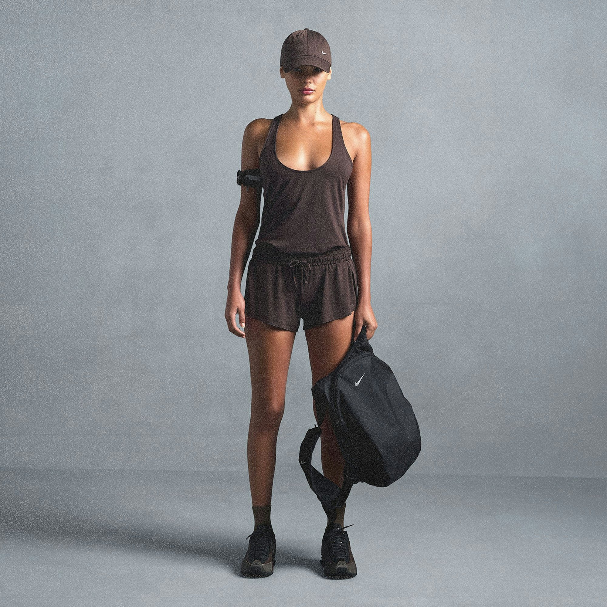 NikeSKIMS AIRY RACER BACK TANK | DARK SEPIA ON A MODEL SIDE VIEW @ | FOCUS: 0.0, 1.0, 0.9
