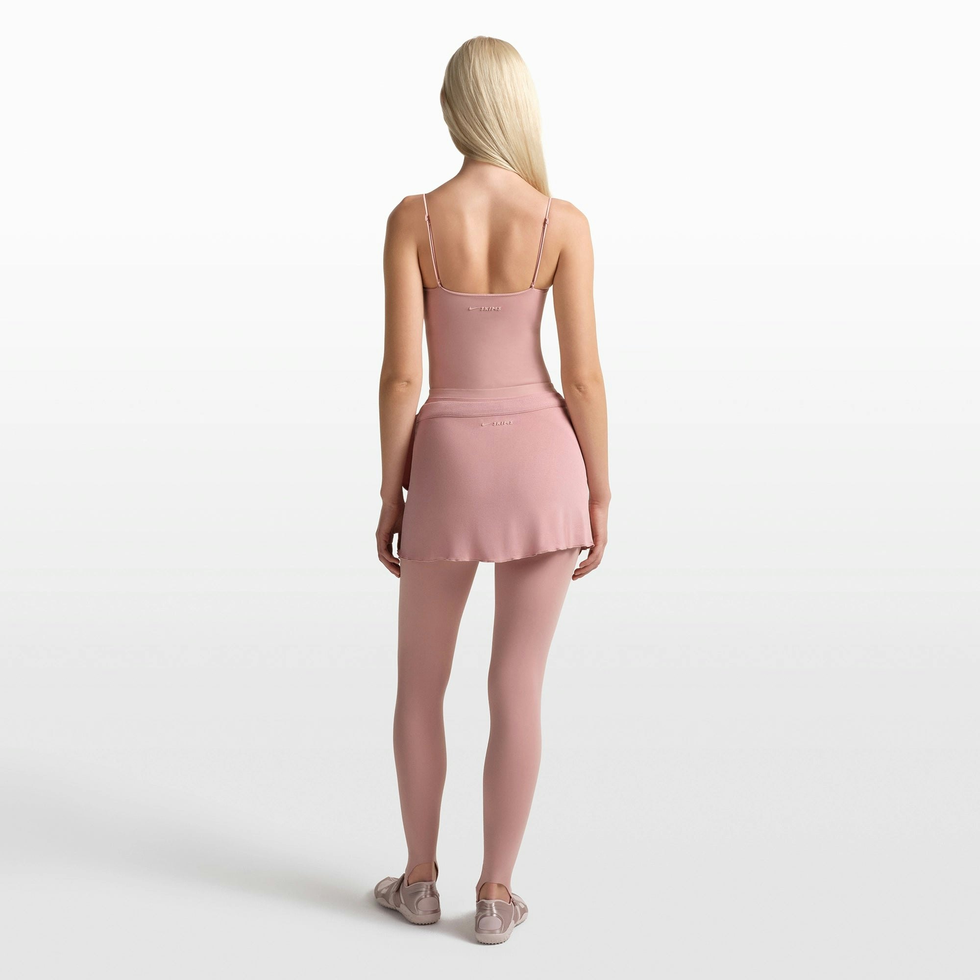 NikeSKIMS MATTE SHIRRED FRONT TANK | HIMALAYAN ON A MODEL FRONT VIEW @ | FOCUS: 0.0, 1.0, 0.9