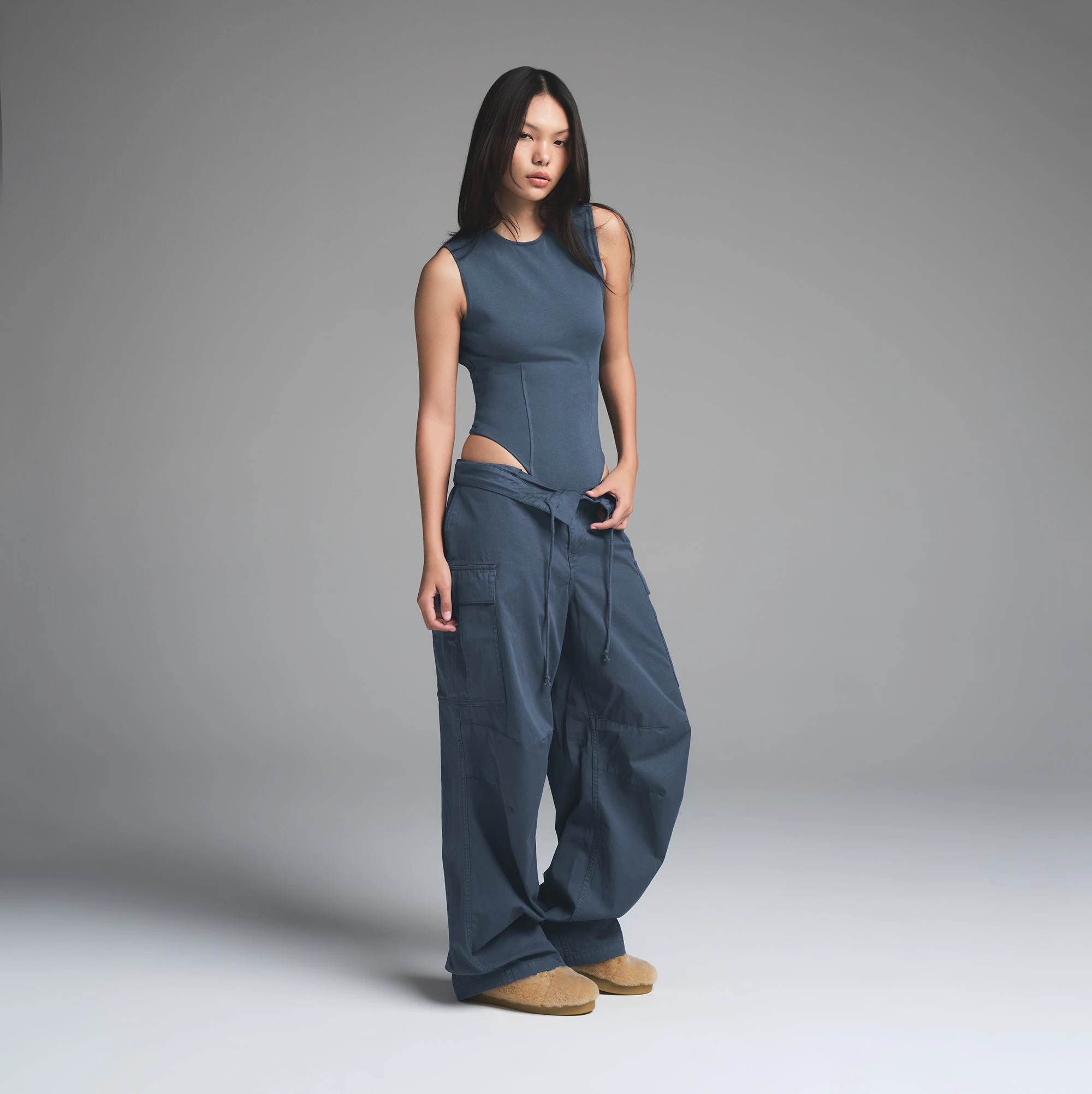 OUTDOOR OPEN BACK BODYSUIT | INDIGO ON A MODEL FRONT VIEW | FOCUS: 0.0, 1.0, 0.9