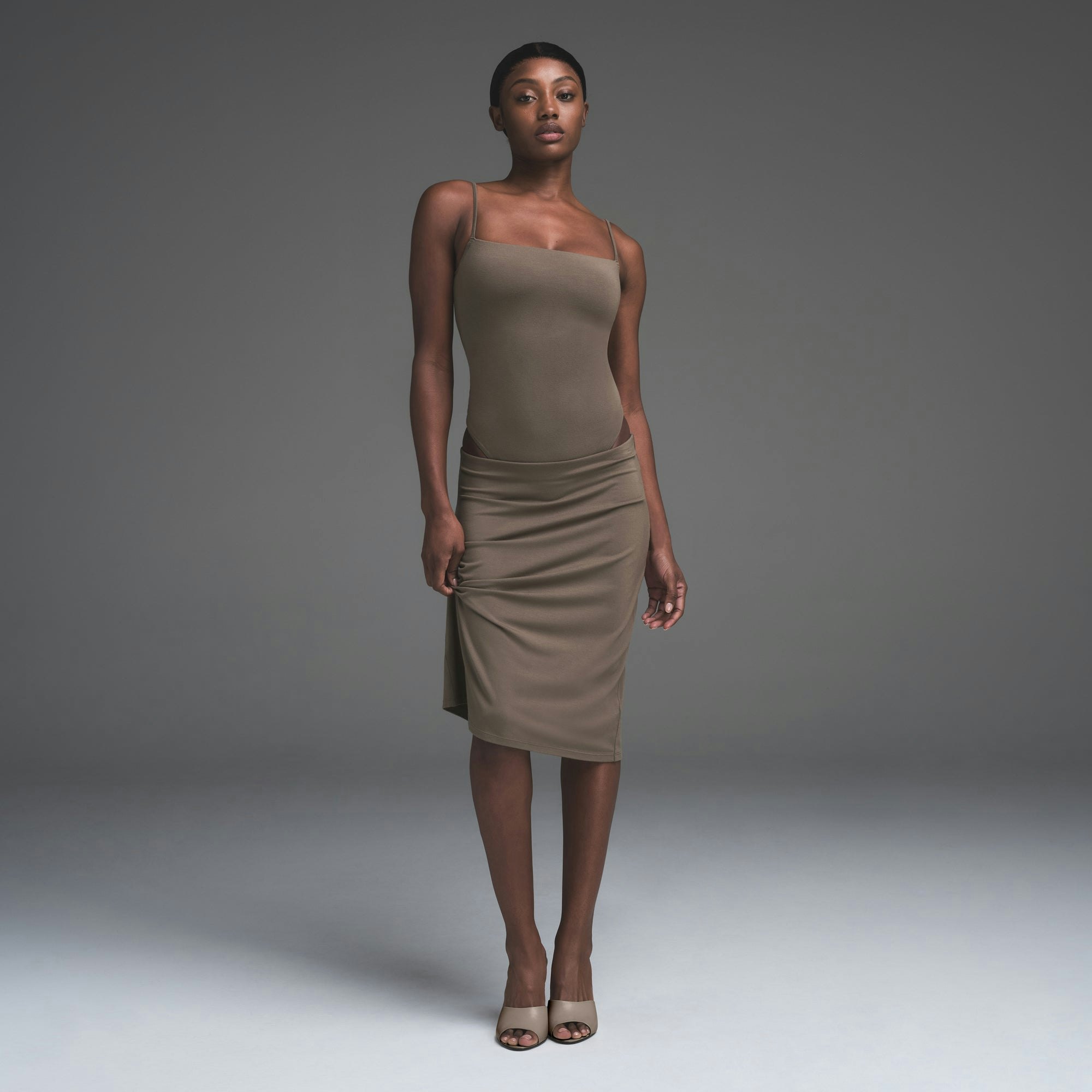 SMOOTH LOUNGE CAMI BODYSUIT | TRUFFLE ON A MODEL BACK VIEW | FOCUS: 0.0, 1.0, 0.9