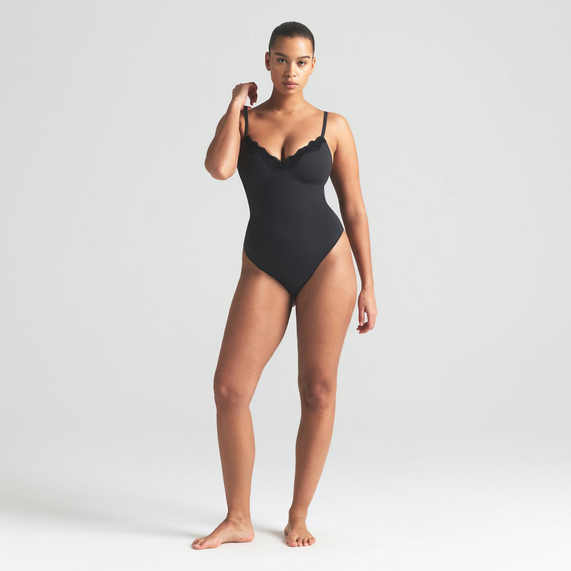 FITS EVERYBODY LACE PUSH-UP BODYSUIT | ONYX ON A MODEL FRONT VIEW | FOCUS: 0.0, 1.0, 0.9