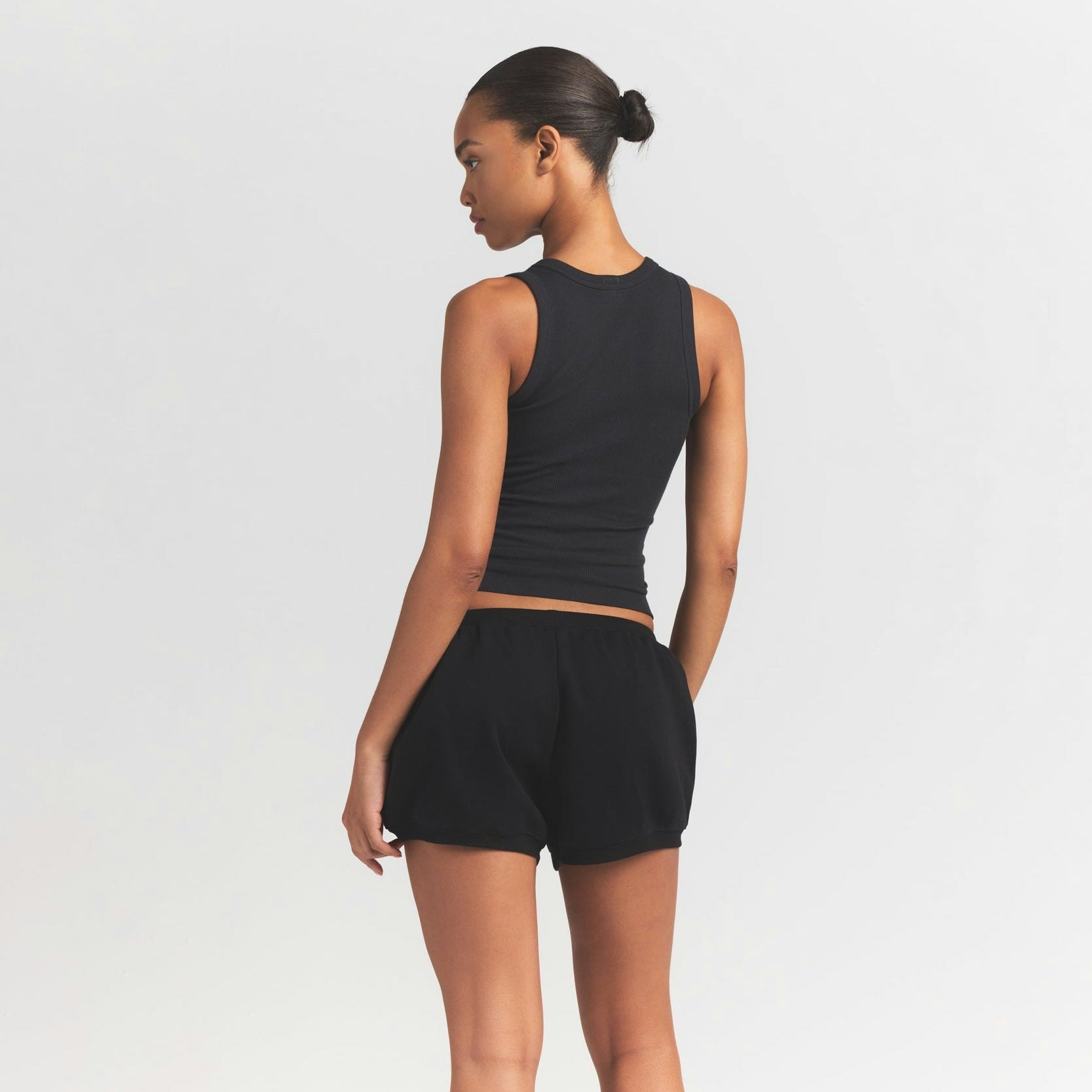 COTTON RIB SCOOP NECK TANK | SOOT ON A MODEL BACK VIEW S | FOCUS: 0.0, 1.0, 0.9