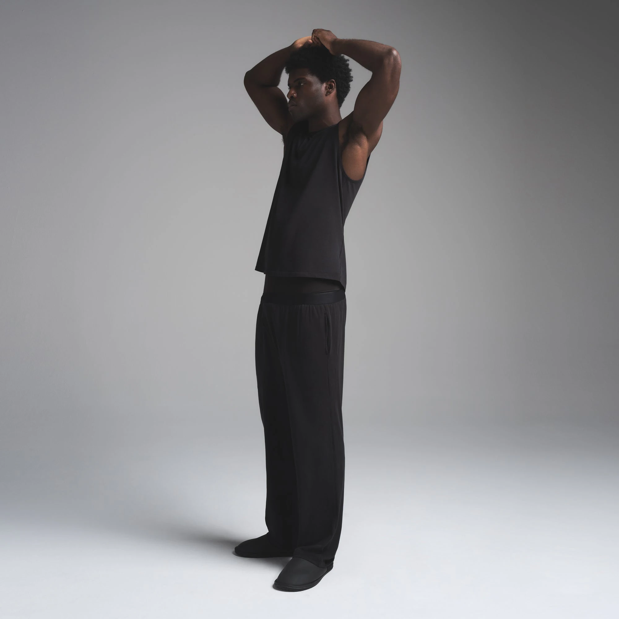 JERSEY SLEEP MENS TANK | OBSIDIAN (MENS TANKS) ON A MODEL FRONT VIEW