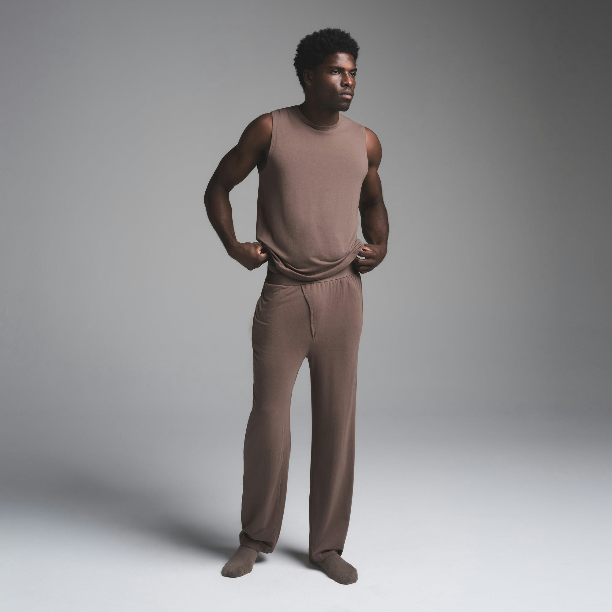 JERSEY SLEEP MENS TANK | UMBER ON A MODEL FRONT VIEW