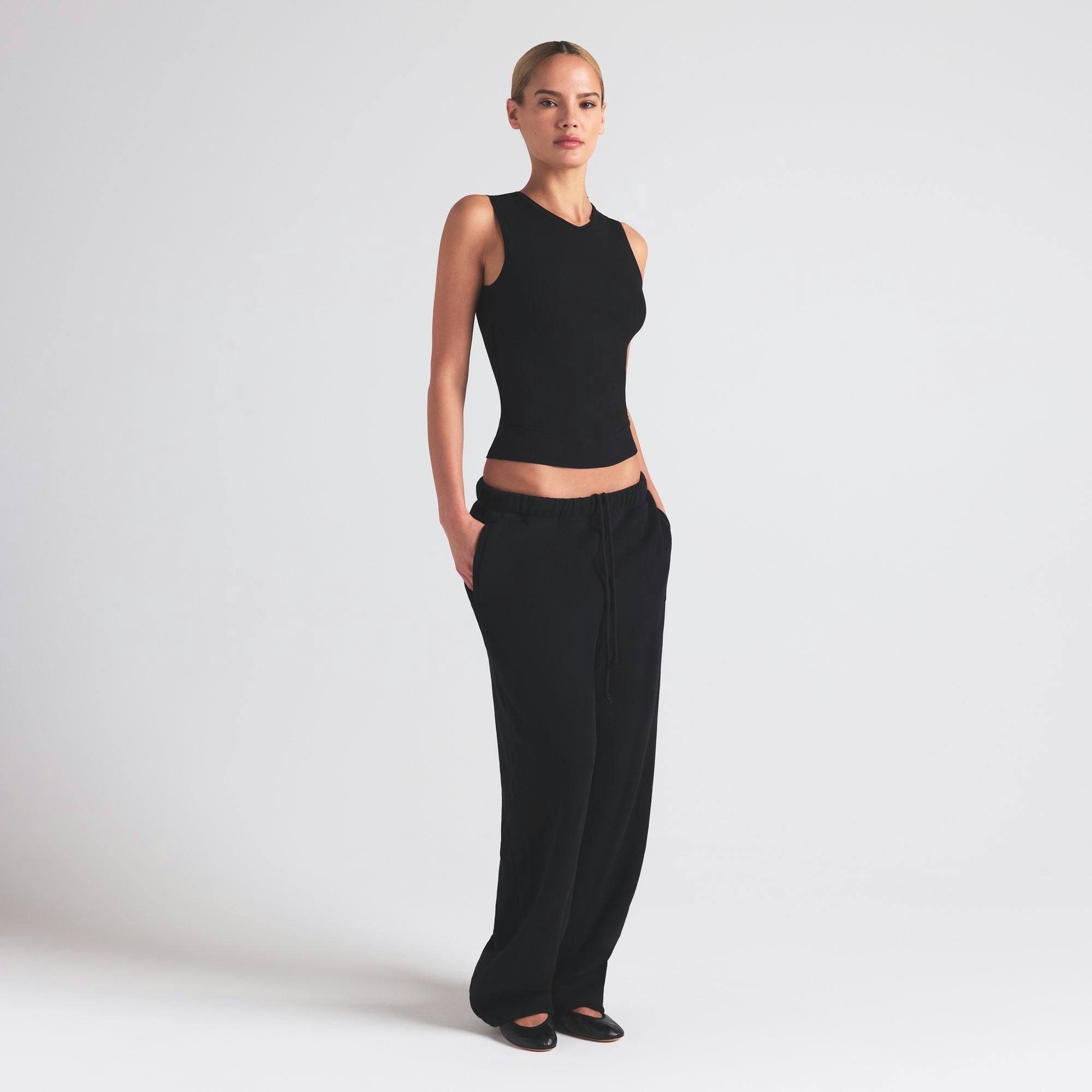 SOFT LOUNGE V NECK TANK | ONYX ON A MODEL FRONT VIEW | FOCUS: 0.0, 1.0, 0.9