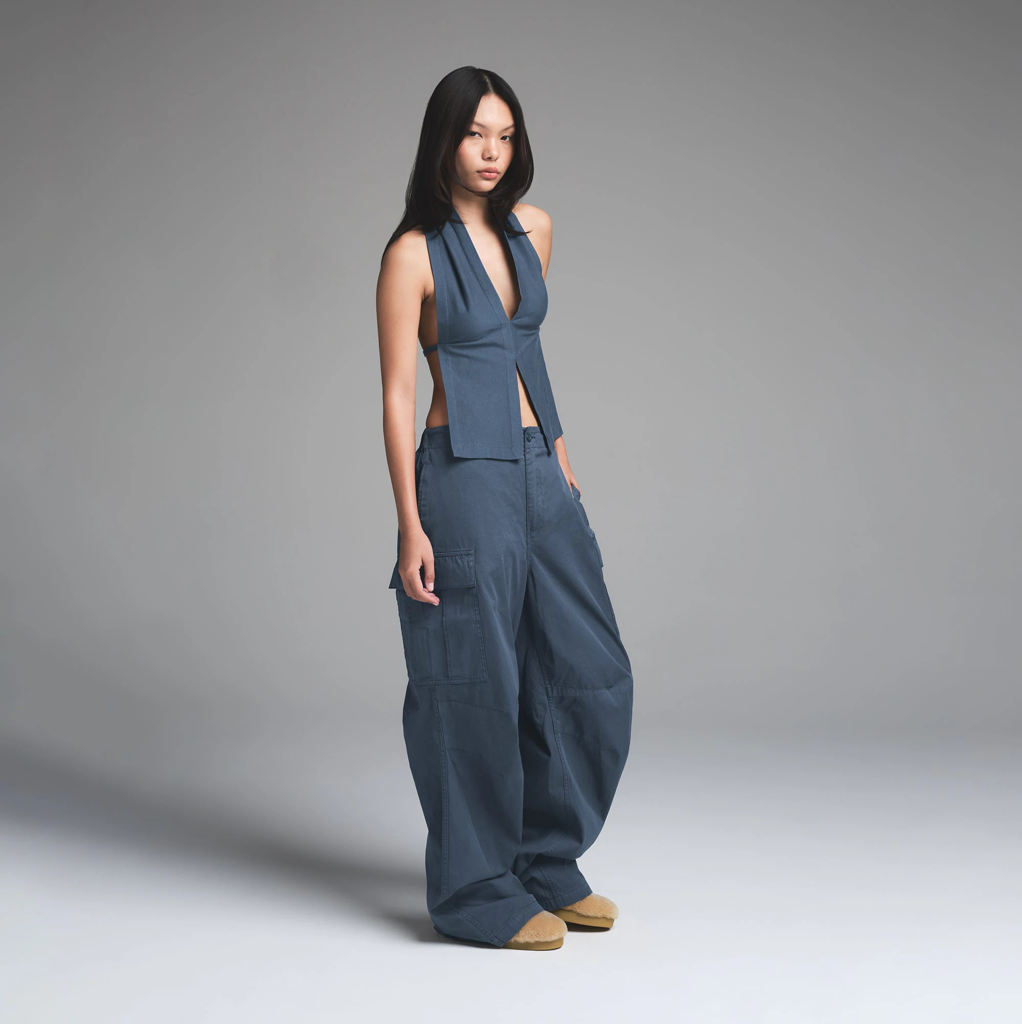 OUTDOOR HEAVY JERSEY HALTER TOP | INDIGO ON A MODEL SIDE VIEW | FOCUS: 0.0, 1.0, 0.9