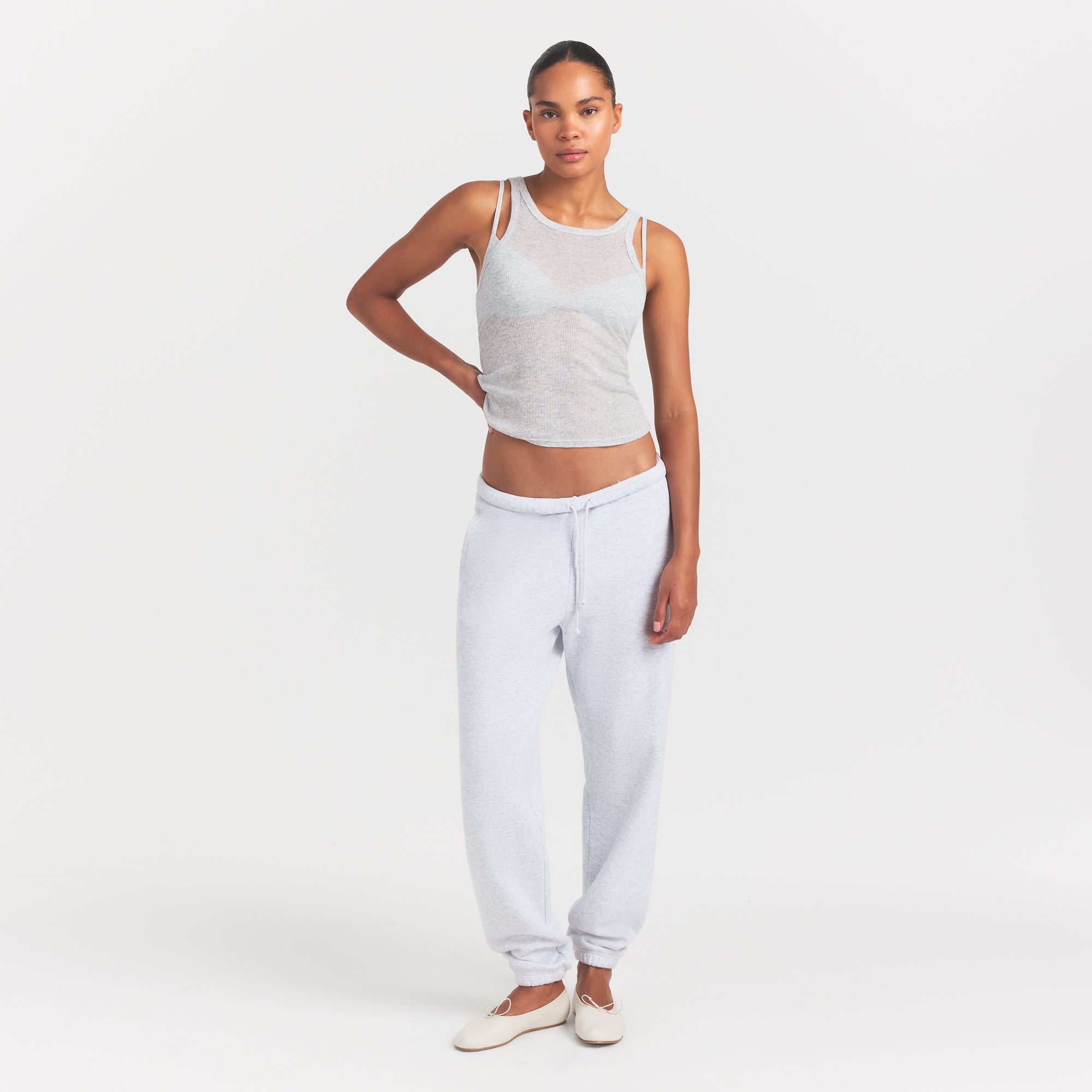 SHEER RIB TANK | LIGHT HEATHER GREY ON A MODEL FRONT VIEW @ | FOCUS: 0.0, 1.0, 0.9