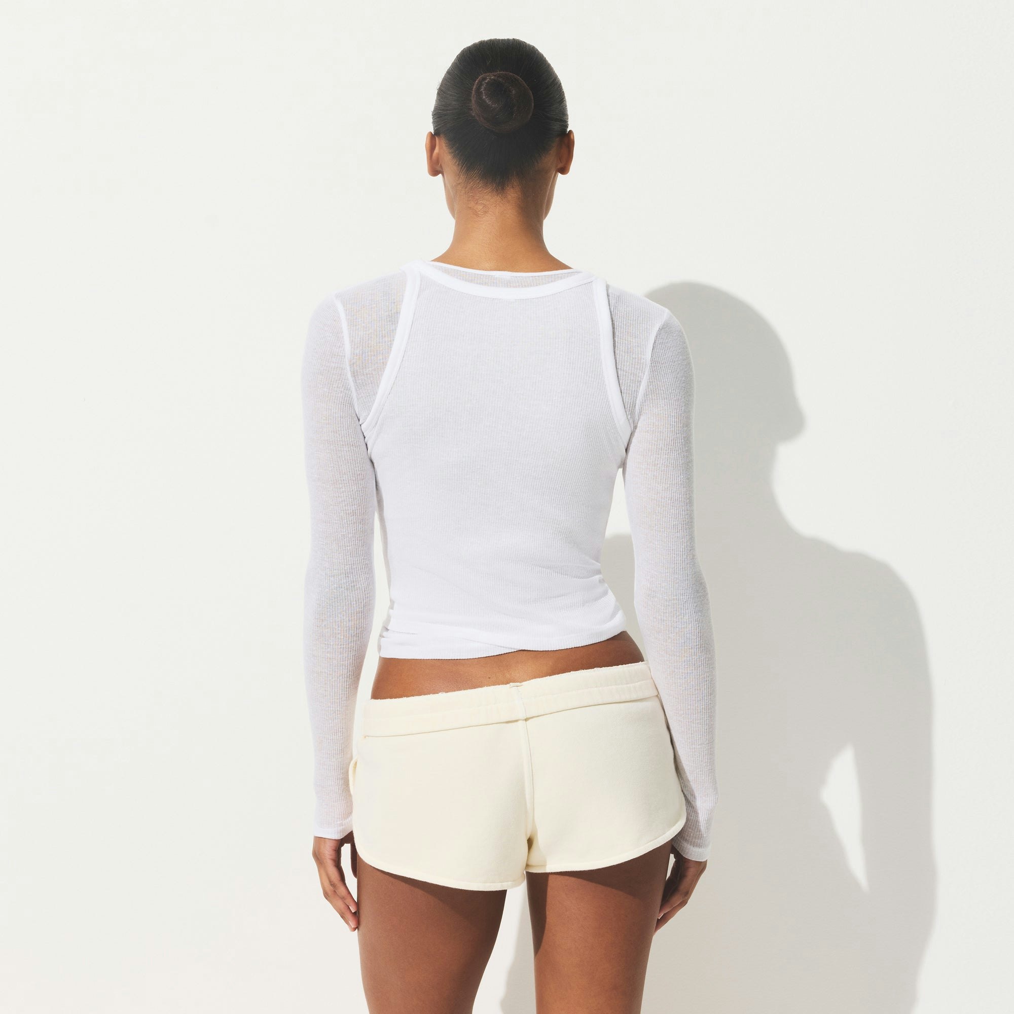 SHEER COTTON TANK | SNOW ON A MODEL SIDE VIEW | FOCUS: 0.0, 1.0, 0.9