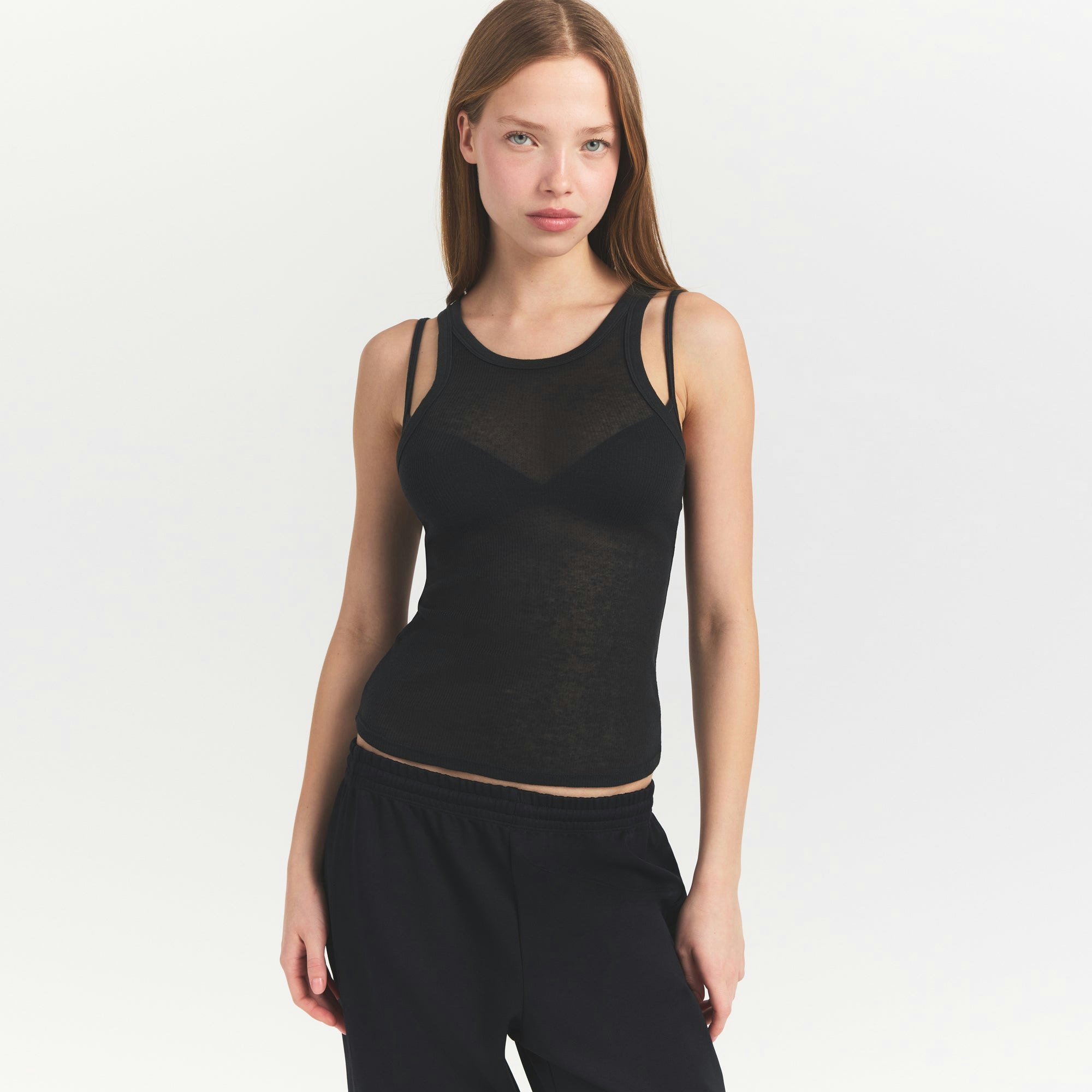 SHEER RIB TANK | SOOT ON A MODEL SIDE VIEW @ | FOCUS: 0.0, 1.0, 0.9