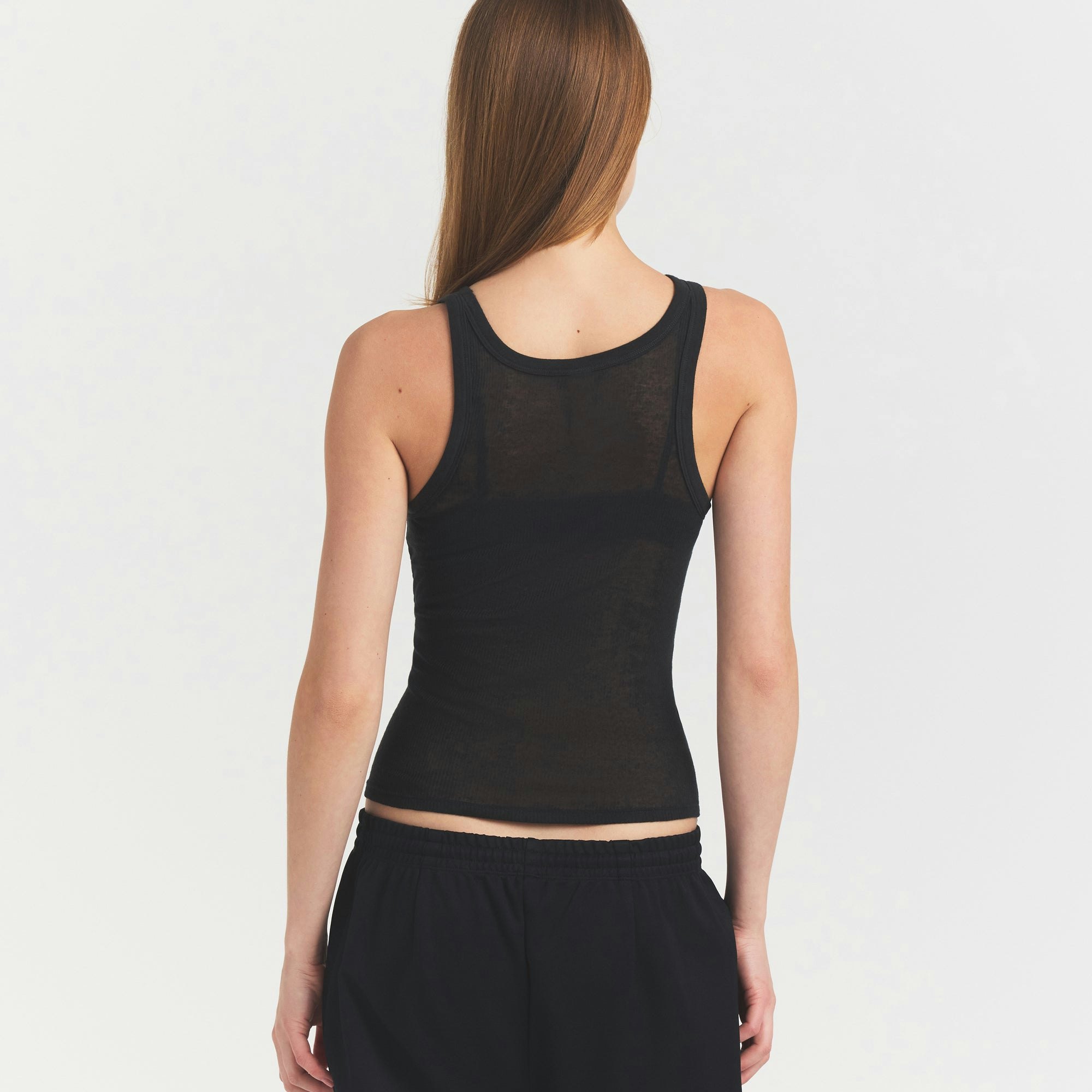 SHEER RIB TANK | SOOT ON A MODEL SIDE VIEW @ | FOCUS: 0.0, 1.0, 0.9