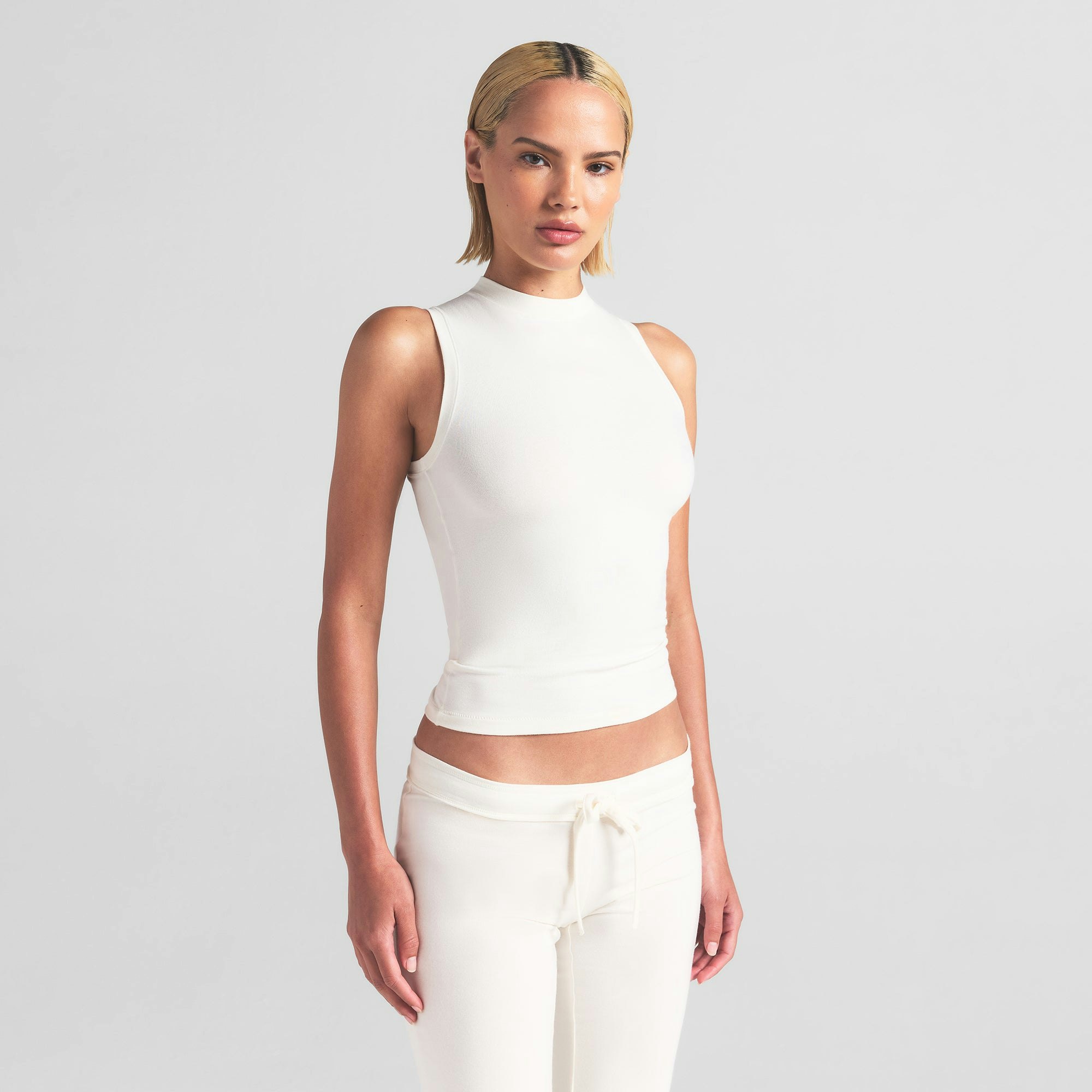 COTTON JERSEY MOCK NECK TANK | MARBLE ON A MODEL FRONT VIEW | FOCUS: 0.0, 1.0, 0.9