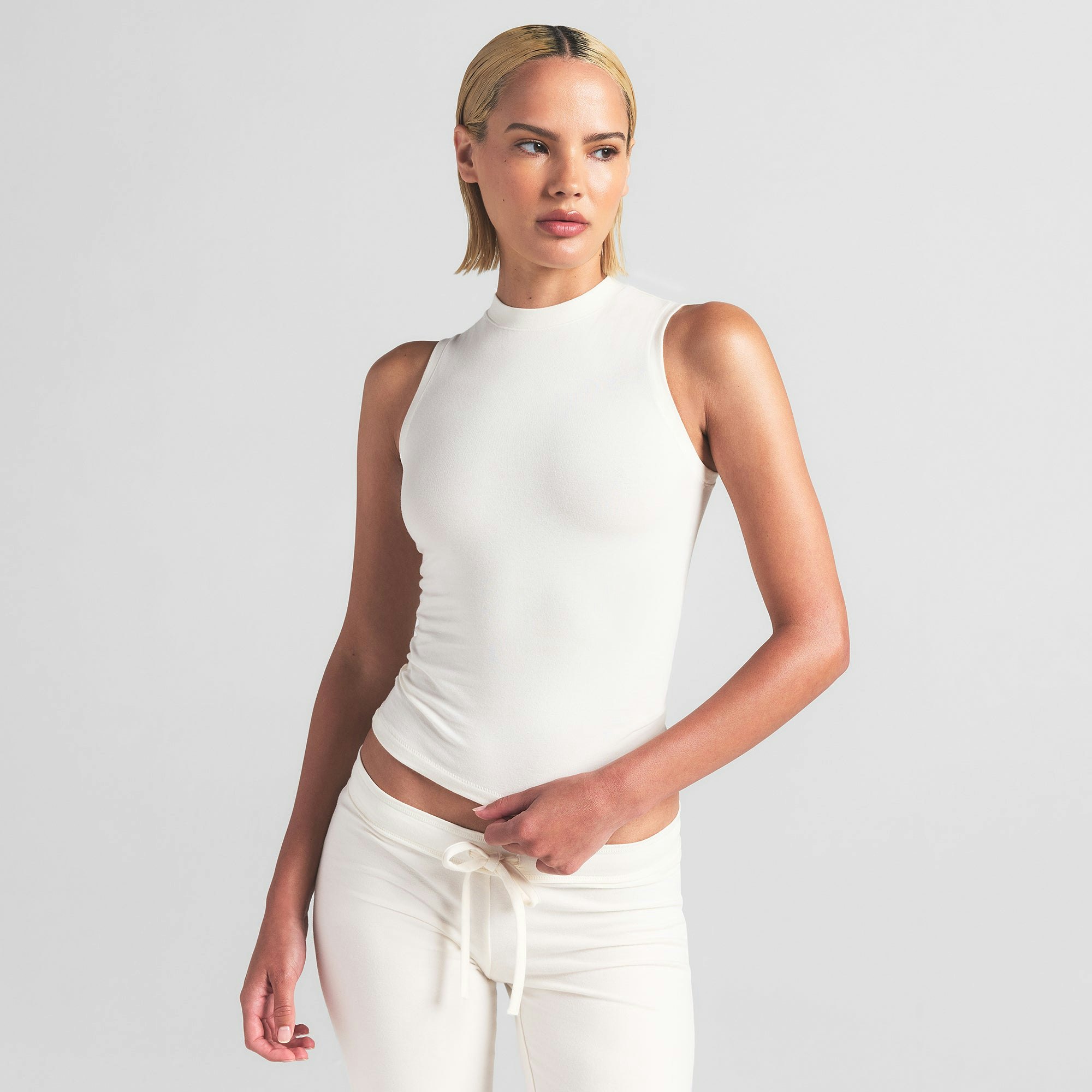COTTON JERSEY MOCK NECK TANK | MARBLE ON A MODEL FRONT VIEW | FOCUS: 0.0, 1.0, 0.9
