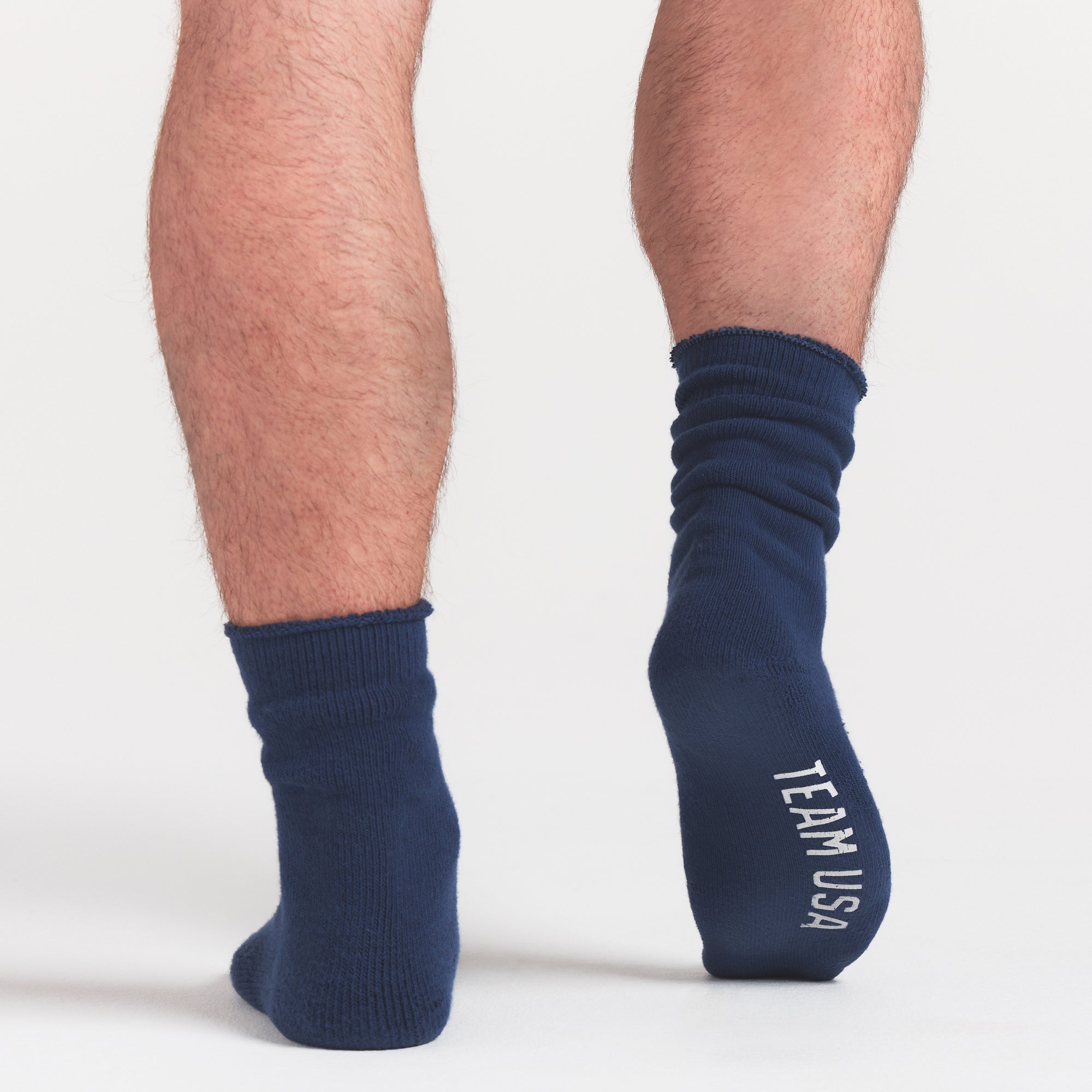 SKIMS FOR TEAM USA MENS OLYMPIC LOUNGE SOCK | NAVYON A MODEL FRONT VIEW @ | FOCUS: 0.0, 1.0, 0.9
