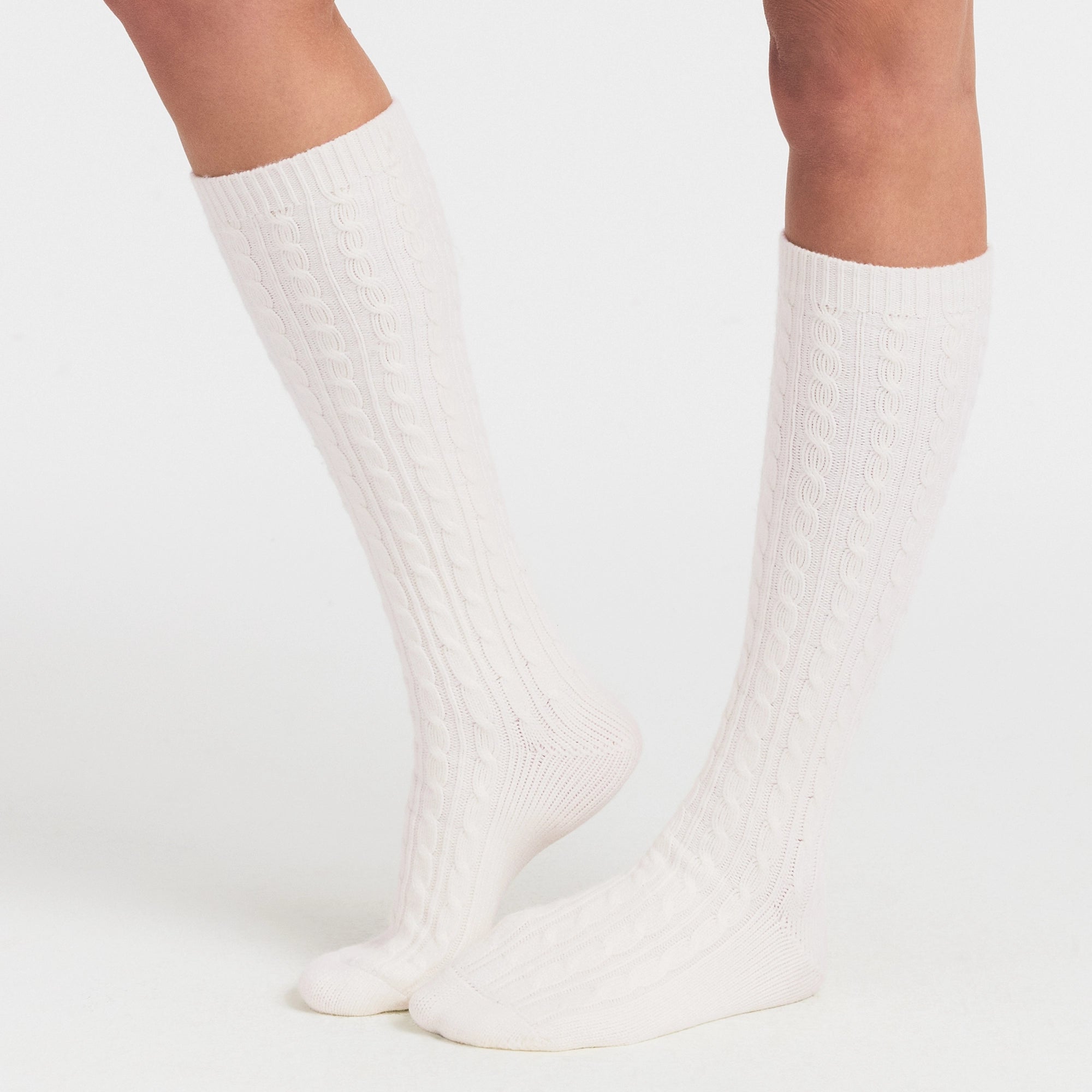 SWEATER KNIT SOCK | IVORY ON A MODEL SIDE VIEW @ | FOCUS: 0.0, 1.0, 0.9