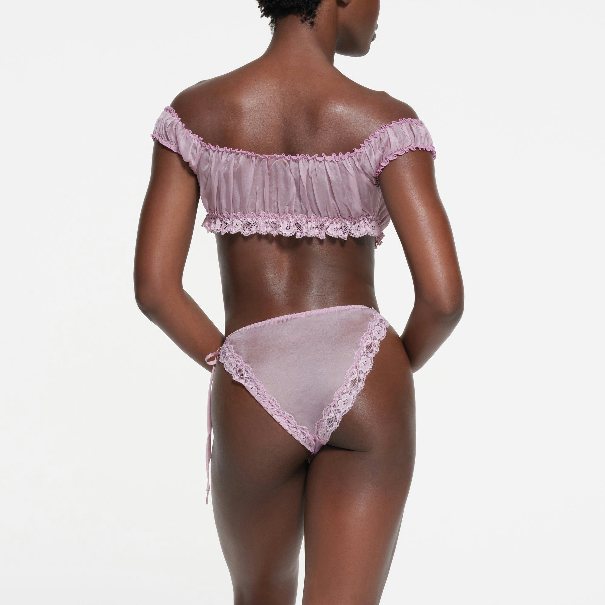 SKIMS ROMANCE SQUARE NECK BRALETTE | IRIS MICA ON A MODEL BACK VIEW