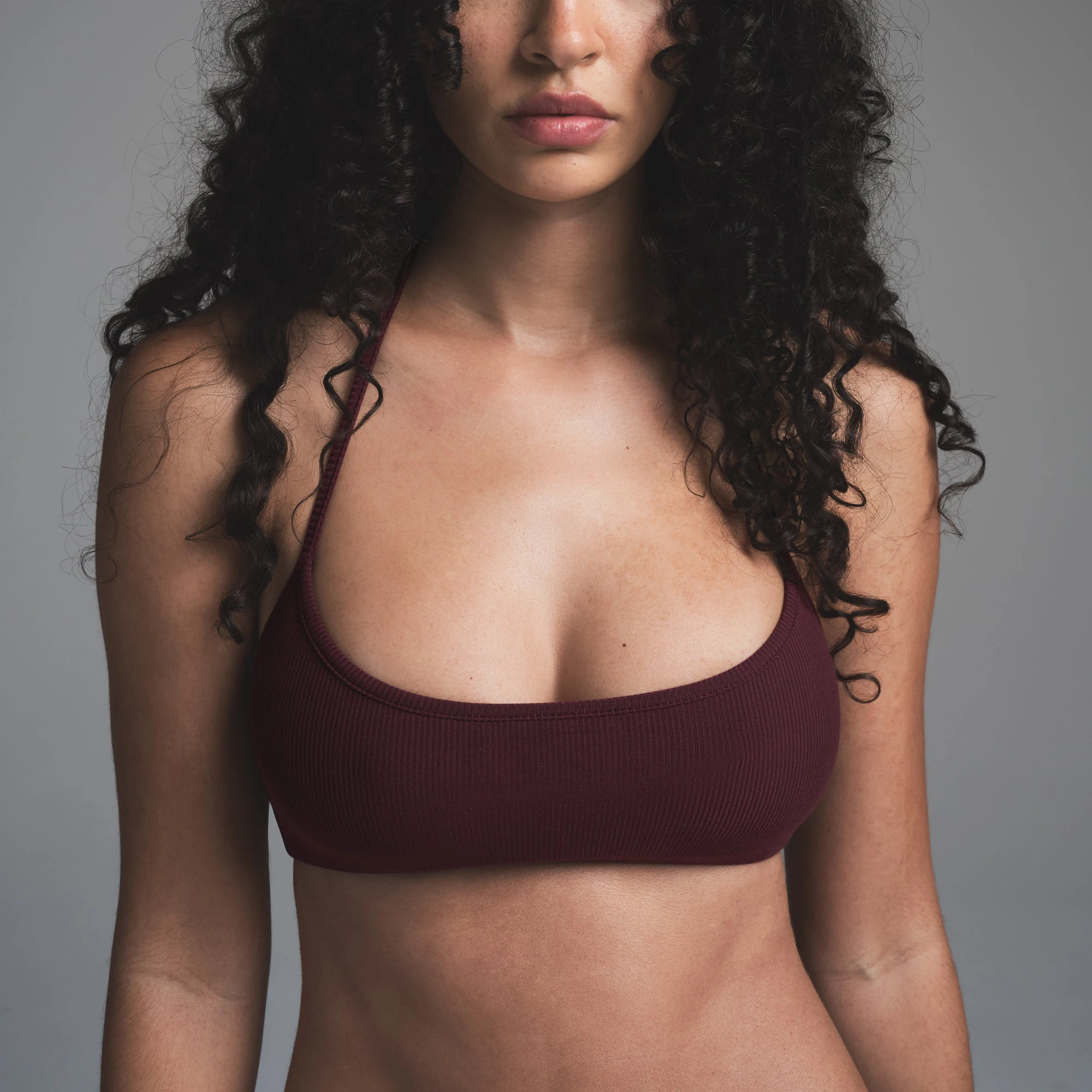 SOFT LOUNGE HALTER SCOOP  BRALETTE | BORDEAUX ON A MODEL SIDE VIEW