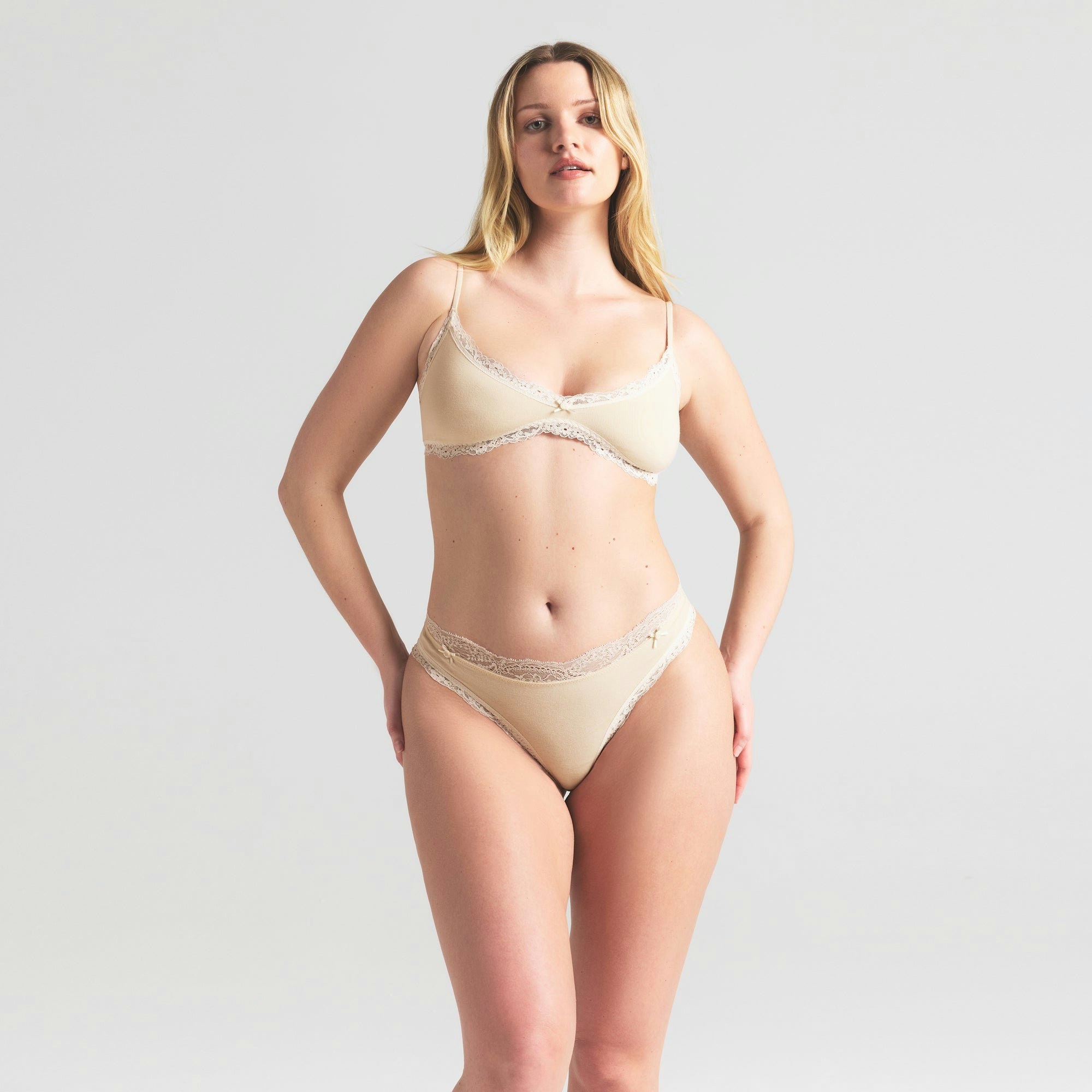 COTTON JERSEY LACE SKIMPY SCOOP BRALETTE | BUTTER ON A MODEL SIDE VIEW | FOCUS: 0.0, 1.0, 0.9