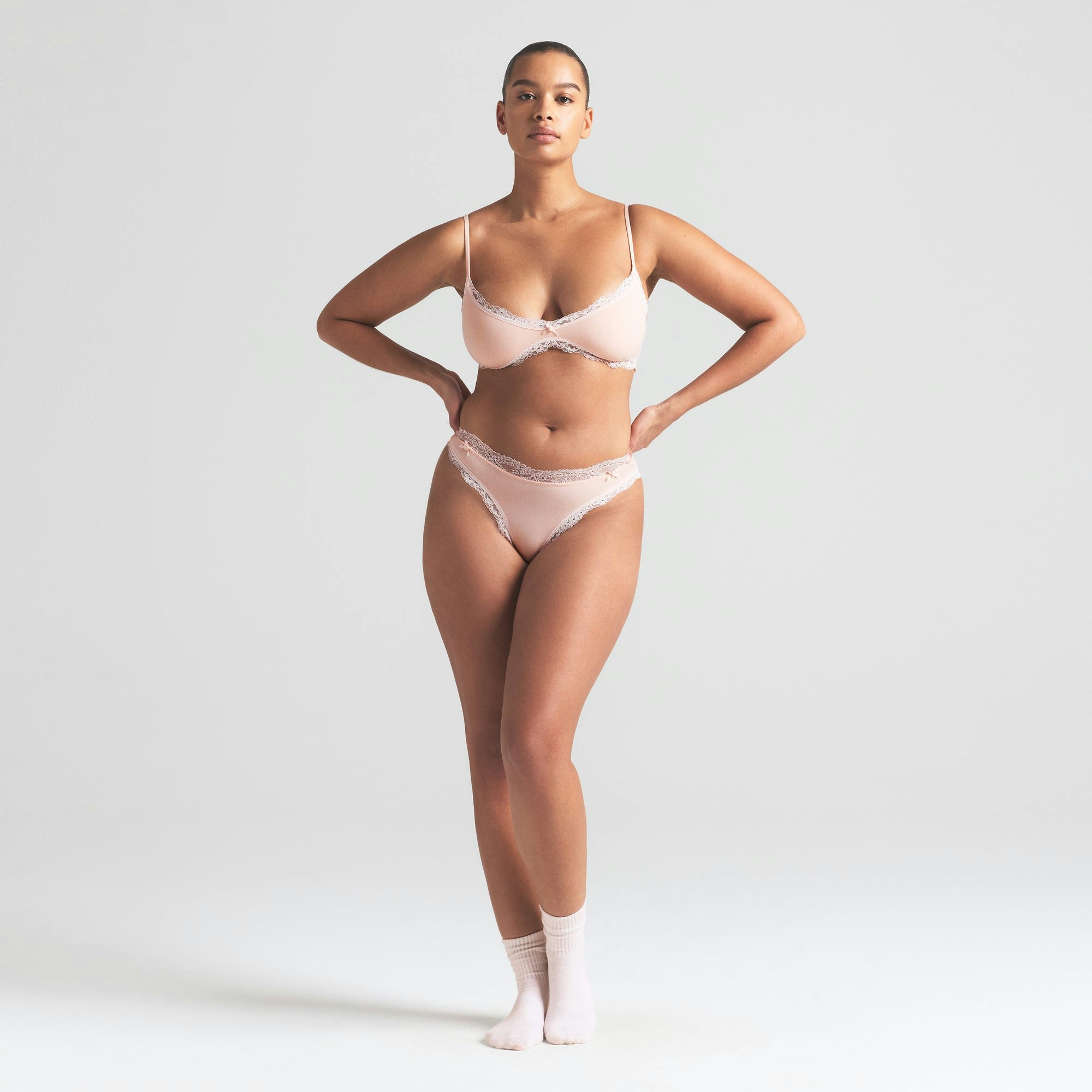 COTTON JERSEY LACE SKIMPY SCOOP BRALETTE | PRIMROSE ON A MODEL FRONT VIEW | FOCUS: 0.0, 1.0, 0.9