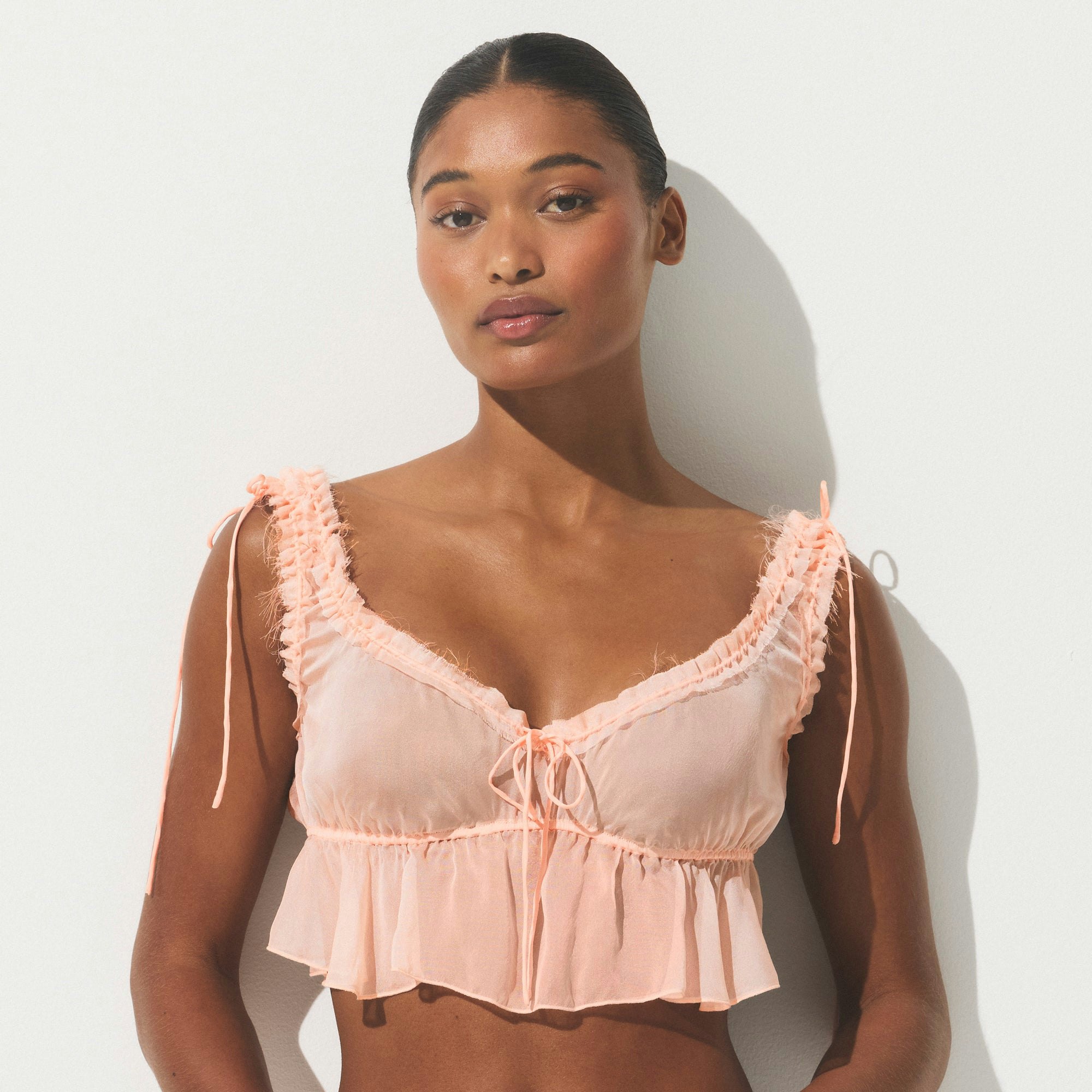 SKIMS ROMANCE BABYDOLL AND SHORT SET | PRIMROSE ON A MODEL SIDE VIEW | FOCUS: 0.0, 1.0, 0.9