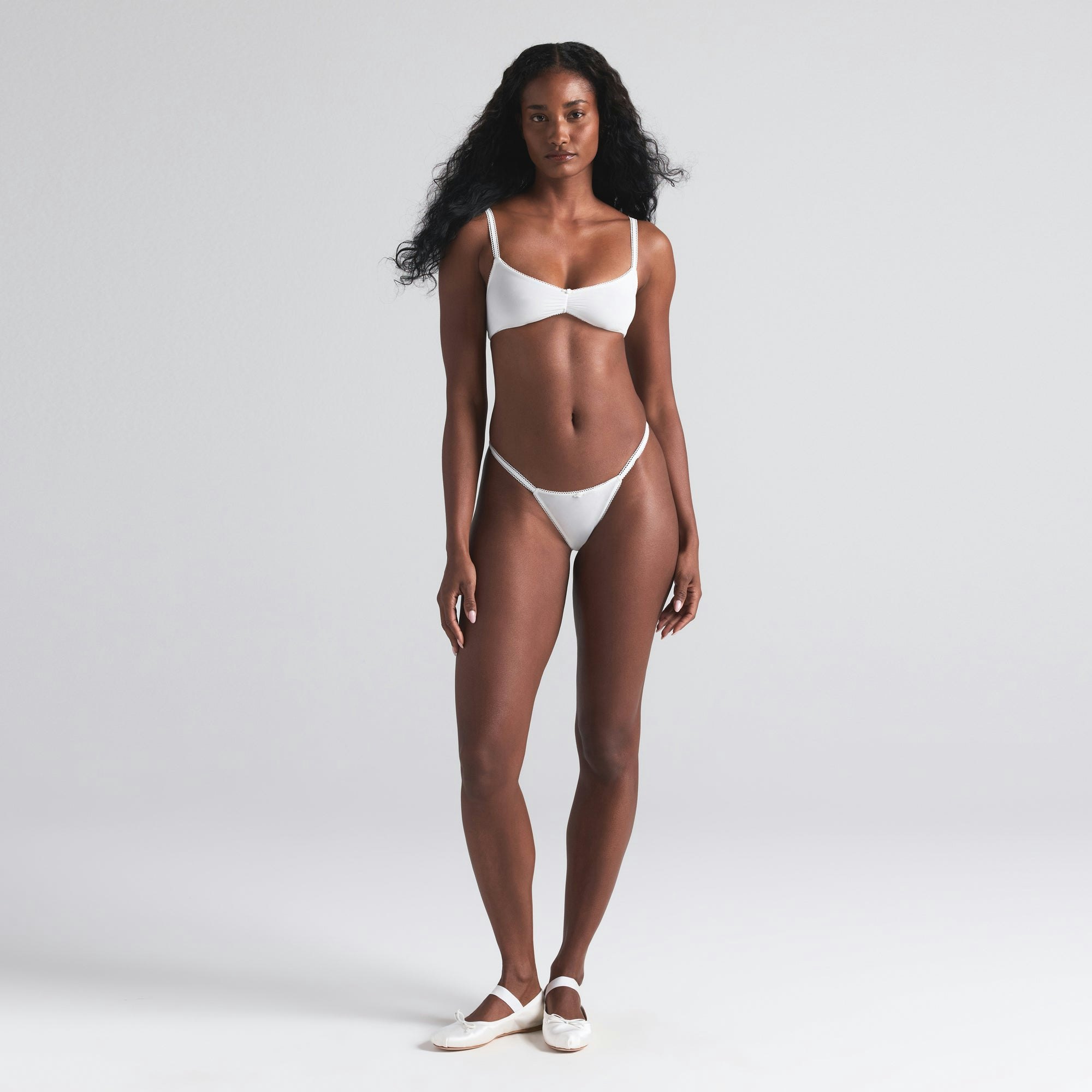 FITS EVERYBODY PICOT SKIMPY SCOOP BRALETTE 2-PACK | MARBLE AND CLOUD BOW PRINT ON A MODEL FRONT  ON A MODEL FRONT VIEW | FOCUS: 0.0, 1.0, 0.9